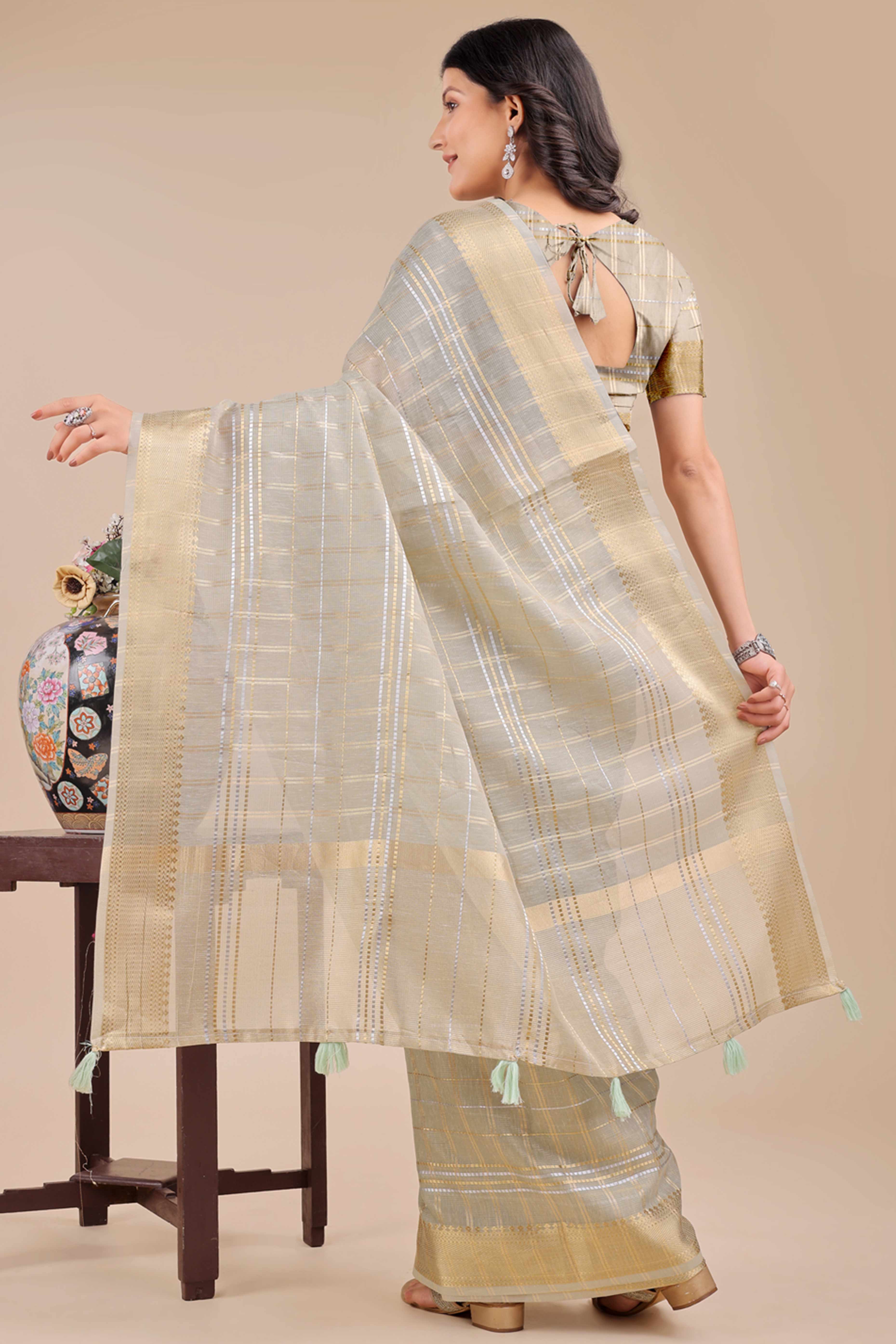 Sea Green Organza Saree with Checkered Zari Weaving and Tassel Detailing