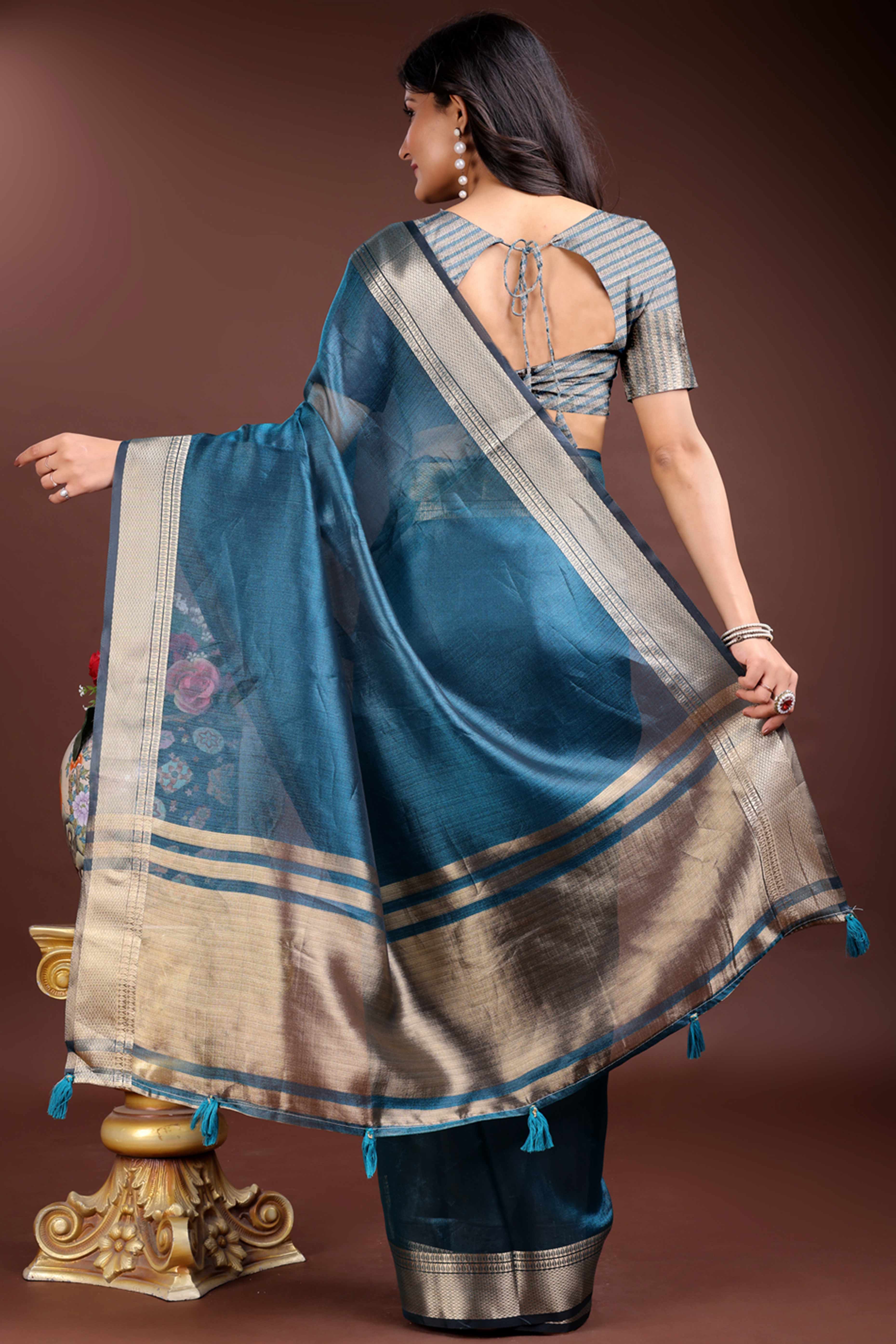 Teal Organza Saree with Zari Border Weaving Grace