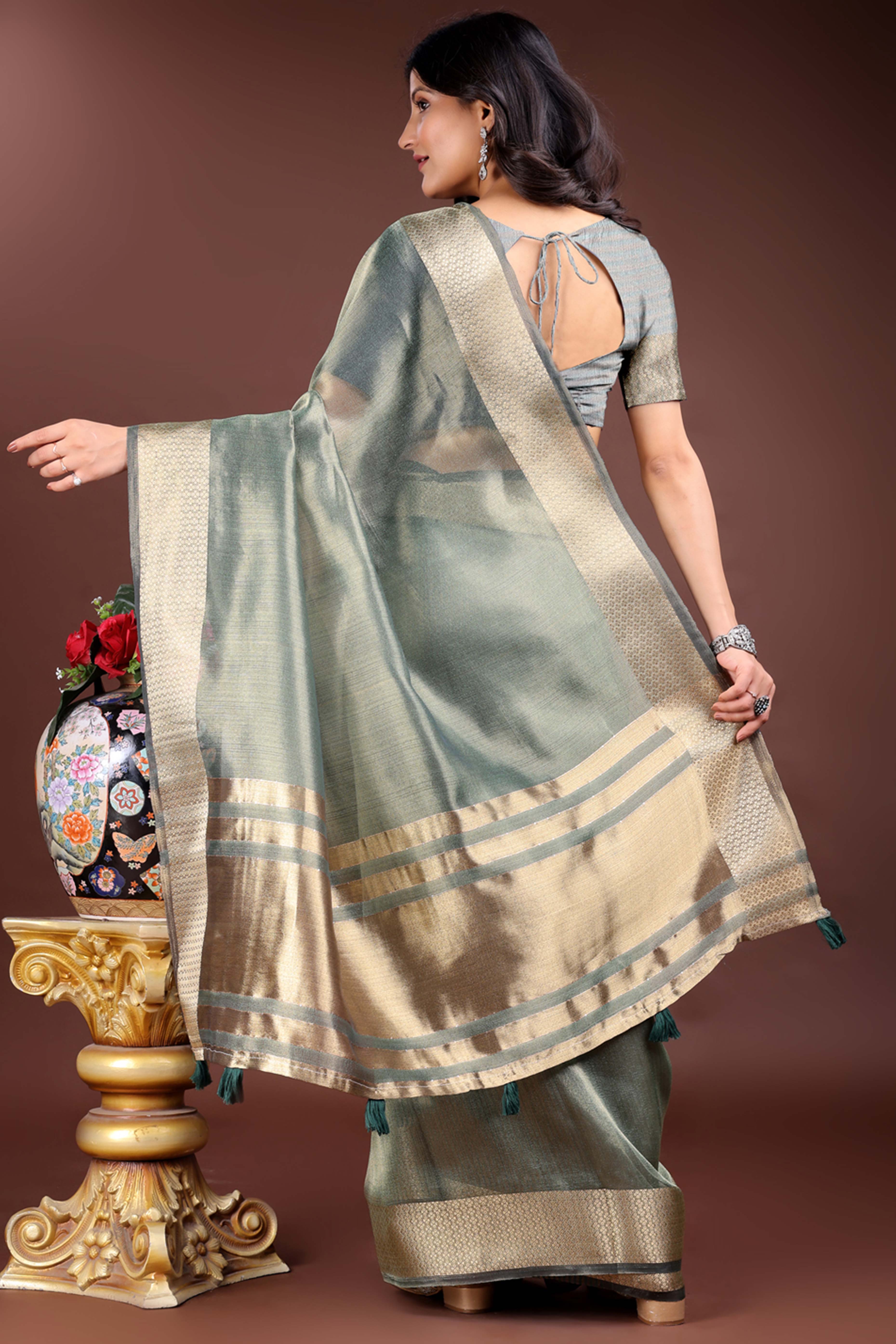 Sage Green Organza Saree with Zari Border Weaving Style