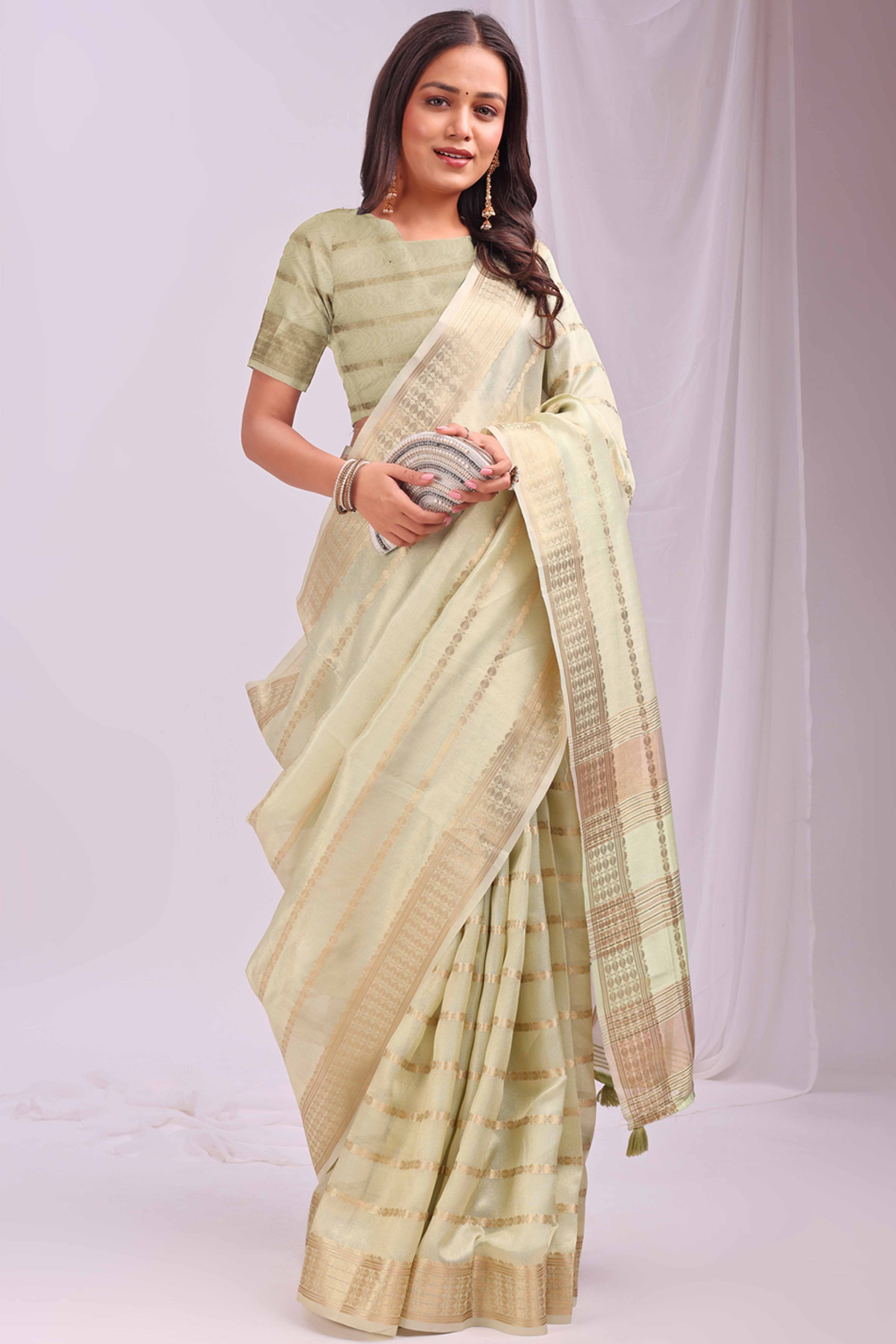 Light Green Lightweight Organza Saree with Rich Zari Stripes Pattern