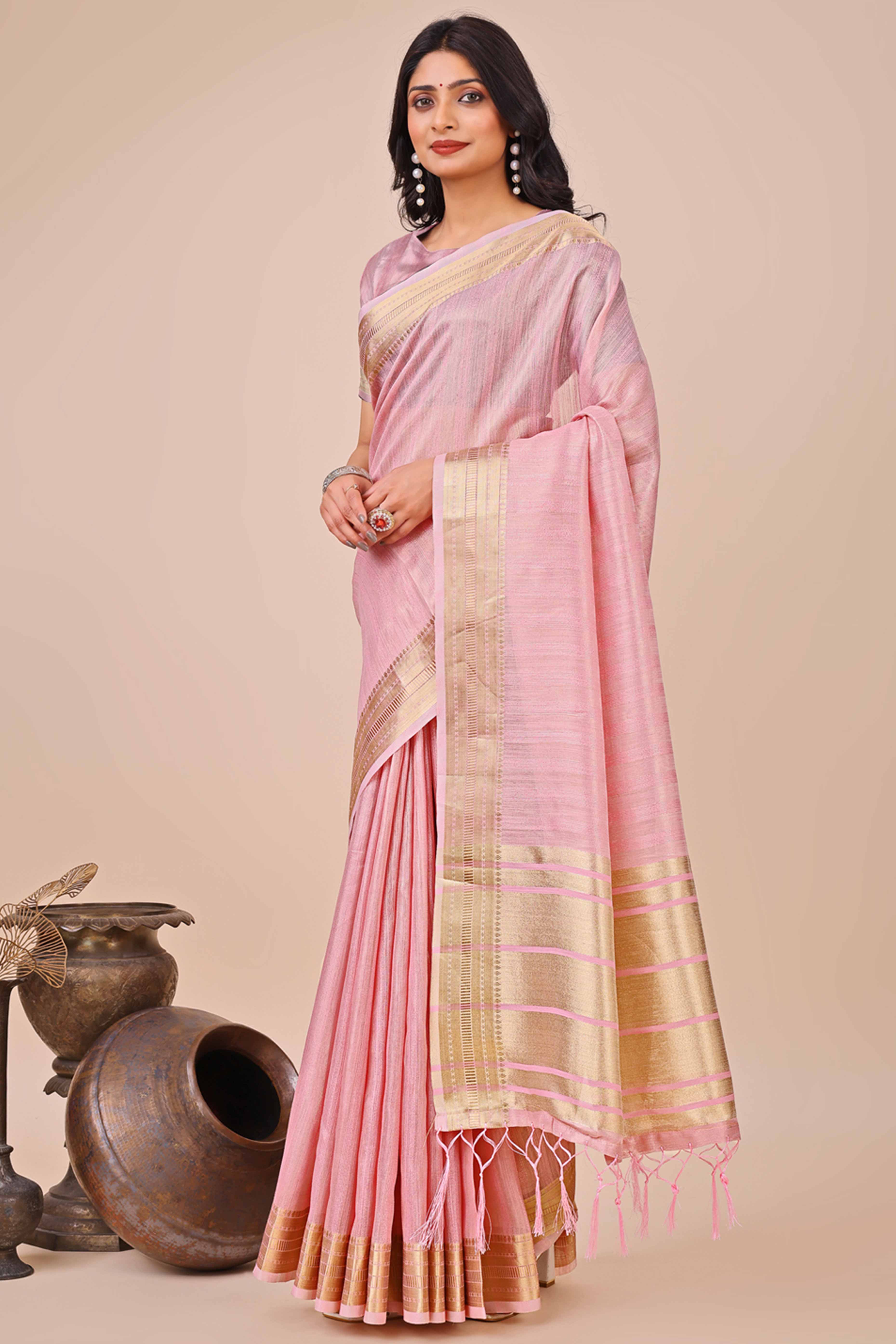 Pink Organza Saree With Intricate Weave & Elegant Tassel Accents