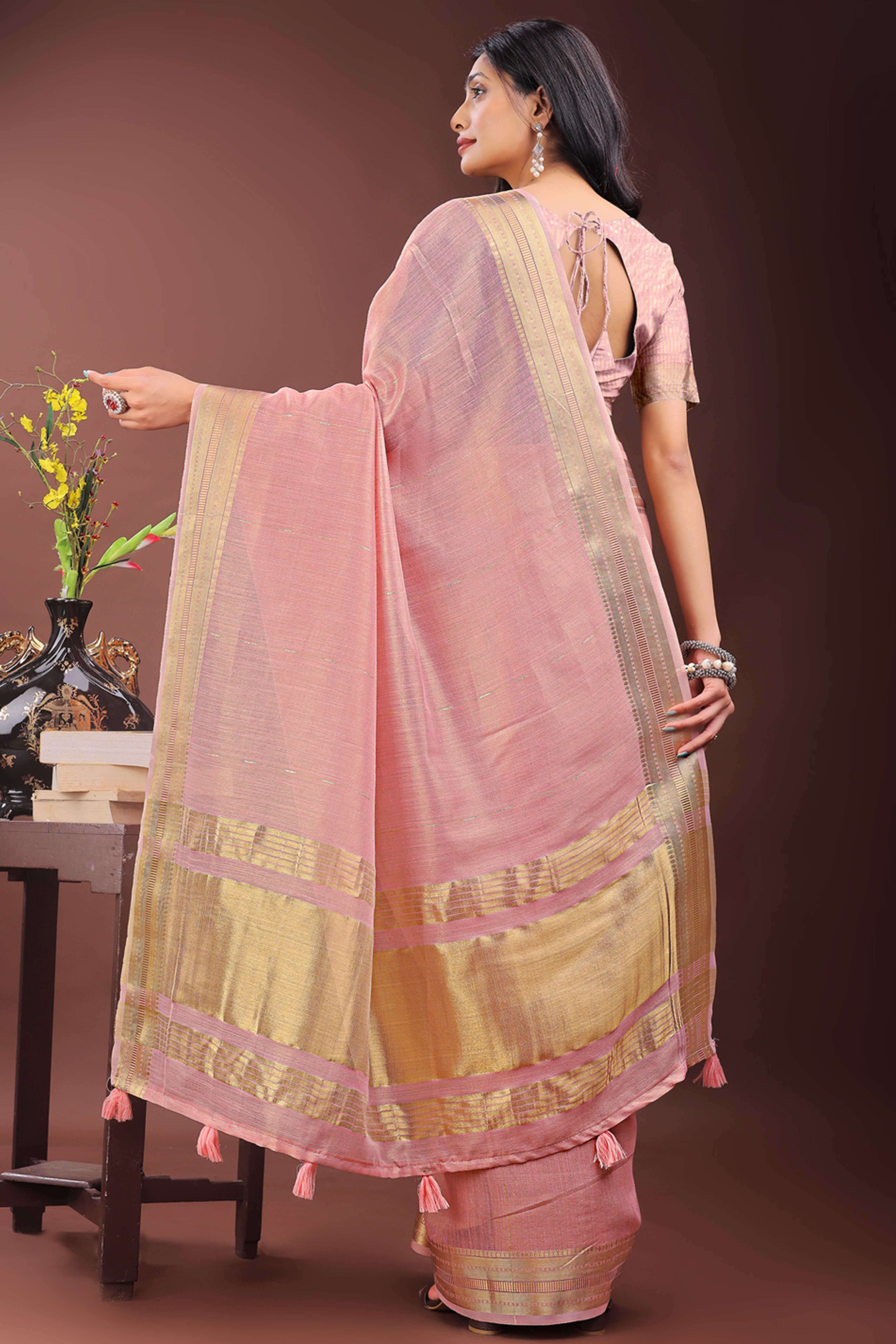 Light Pink Organza Saree Adorned With Zari Weave & Tassel Edges