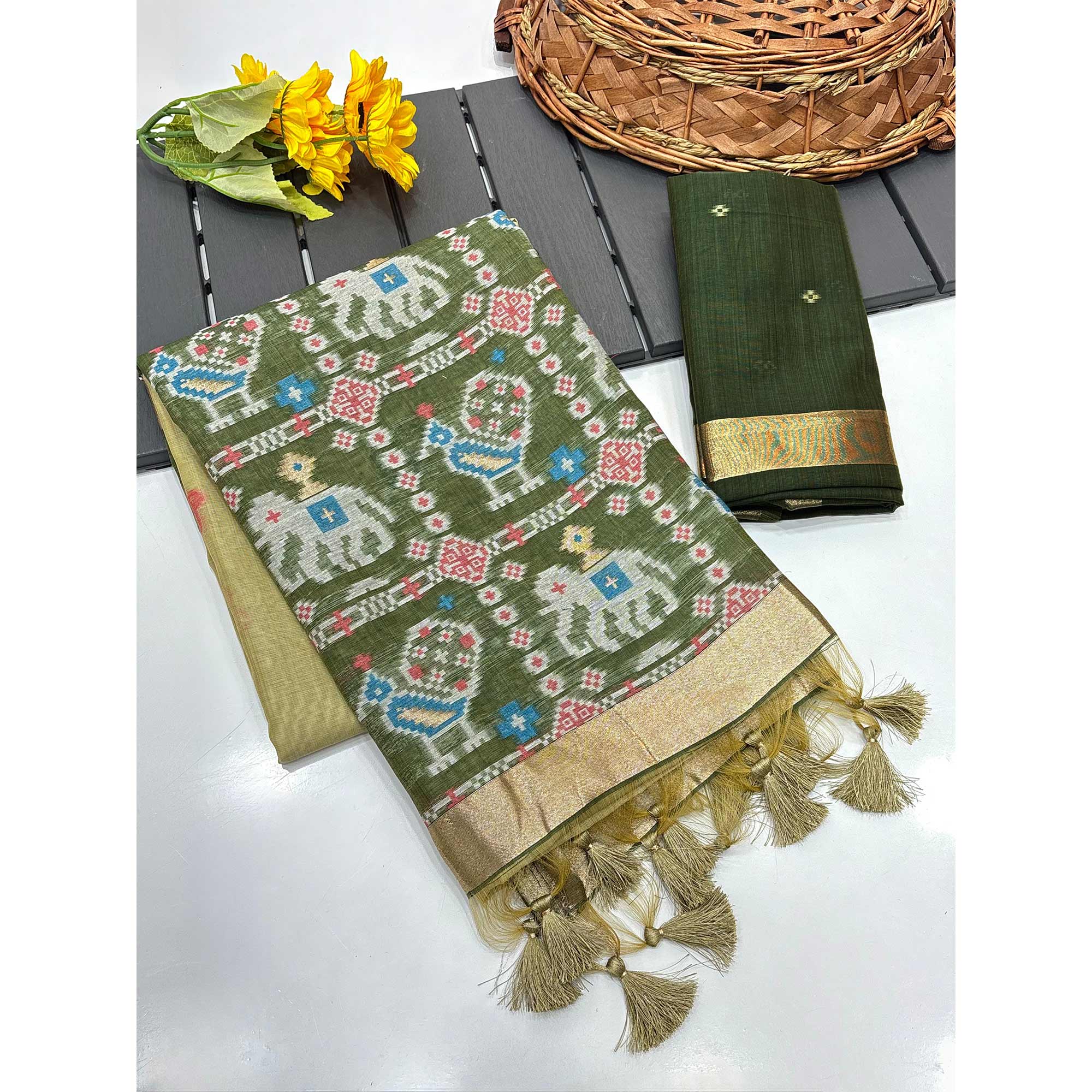 Green Muga Cotton Silk Saree with Traditional Patola Woven Pallu Design