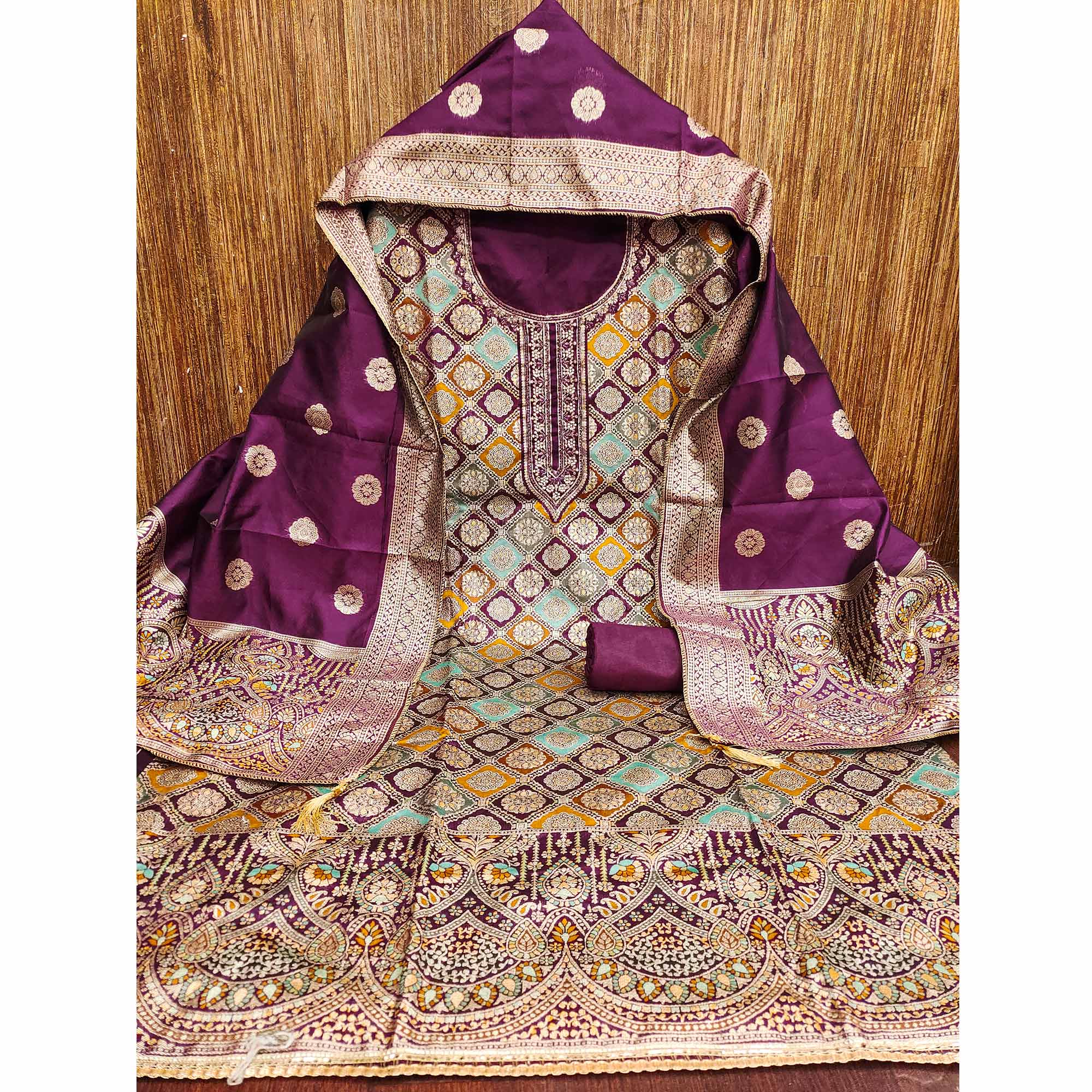 Wine Unstitched Dress Material in Zari Woven Jacquard