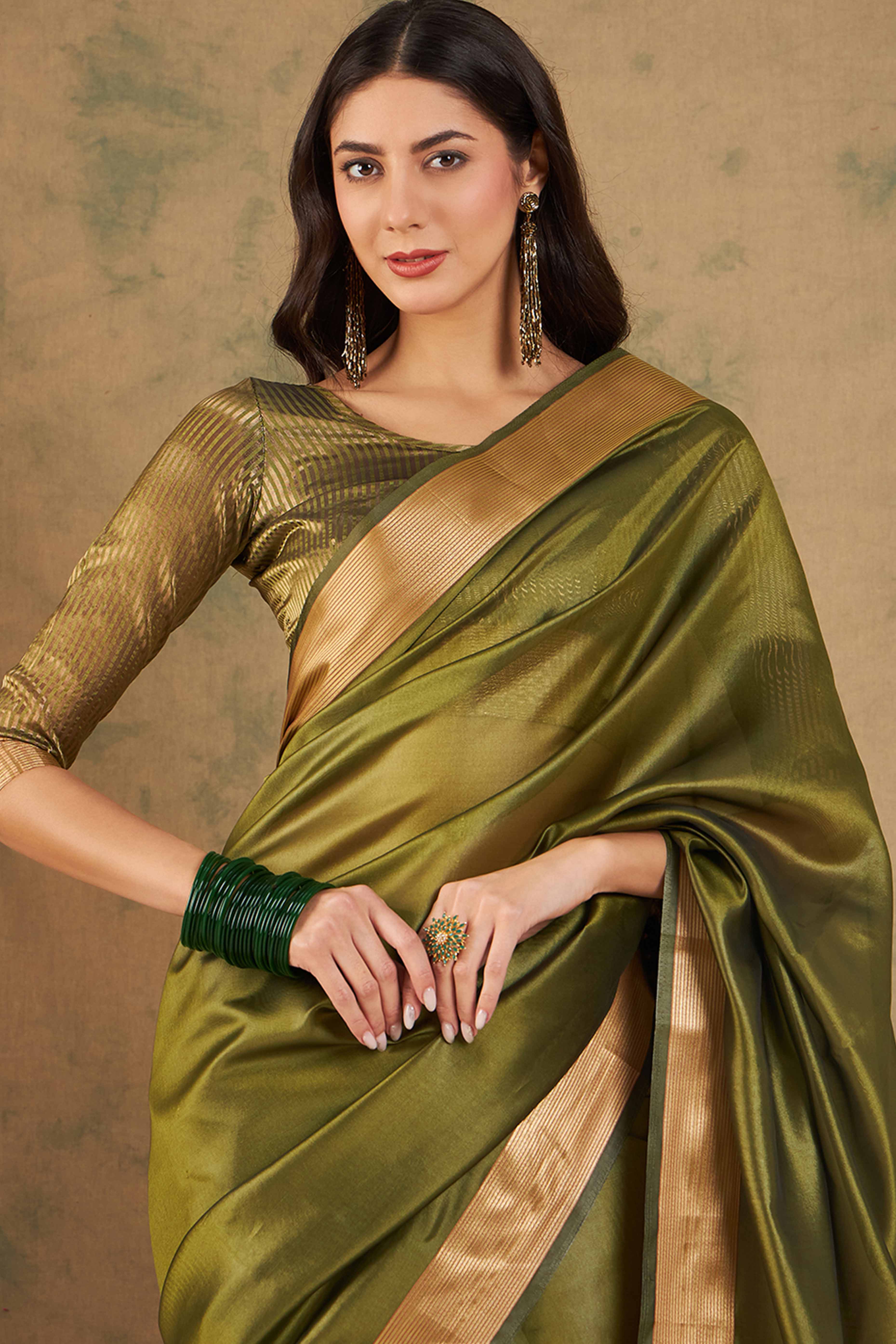 Green Organza Saree In Organza With Delicate Weaving Border And Tassel Details
