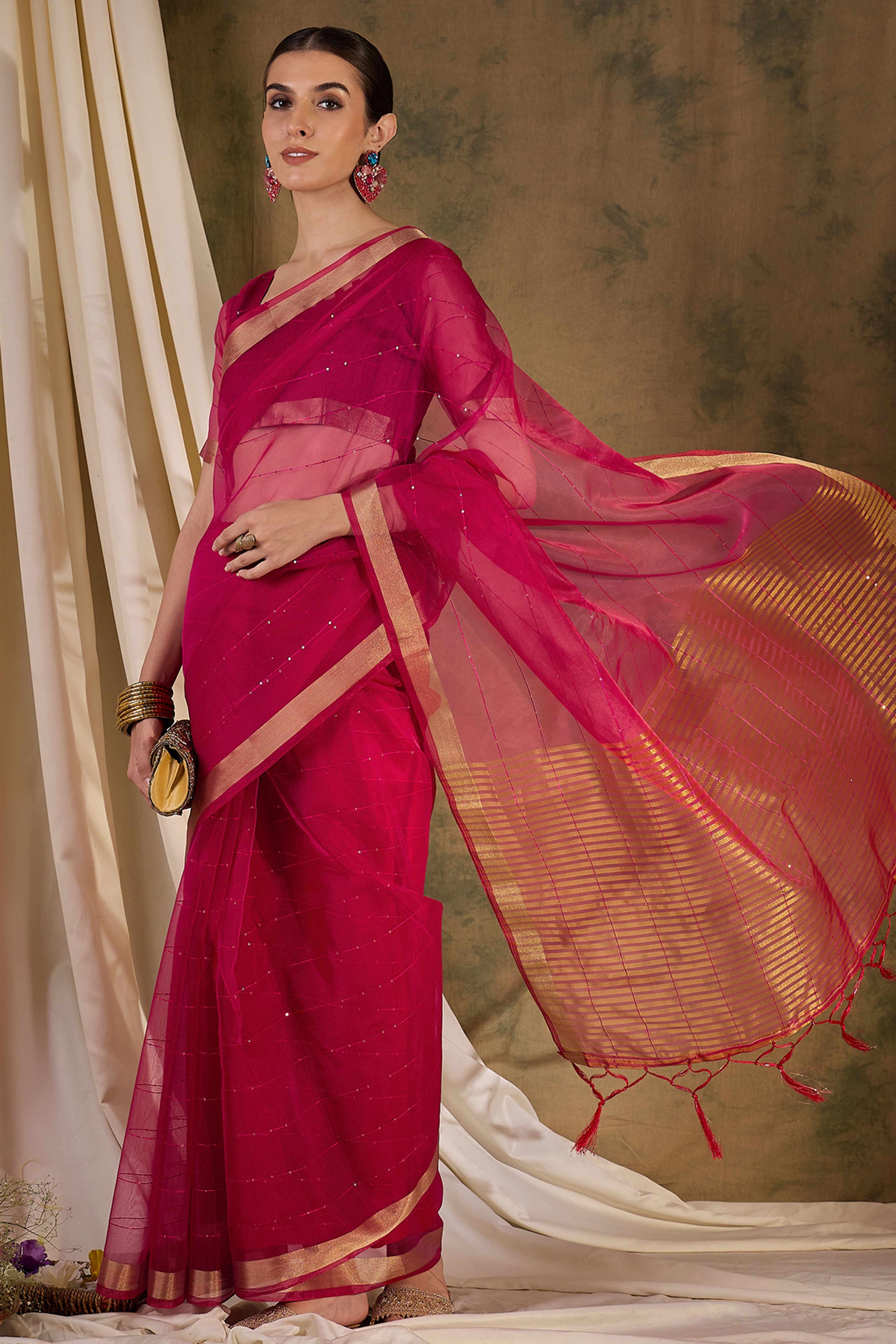 Pink Organza Silk Saree Featuring Shimmering Sequins Embroidery & Elegant Tasselled Pallu