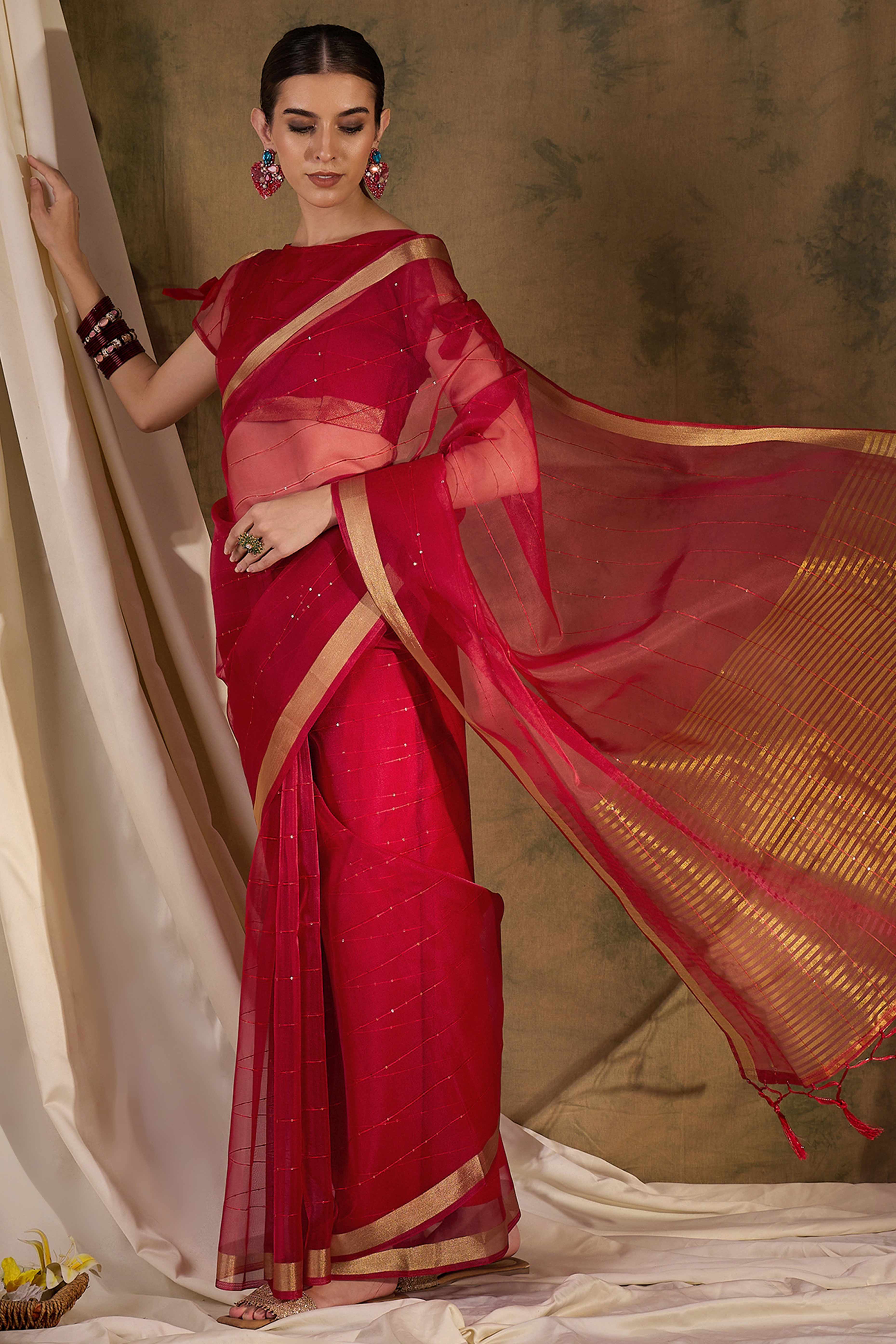 Red Organza Silk Saree Featuring Shimmering Sequins Embroidery & Elegant Tasselled Pallu