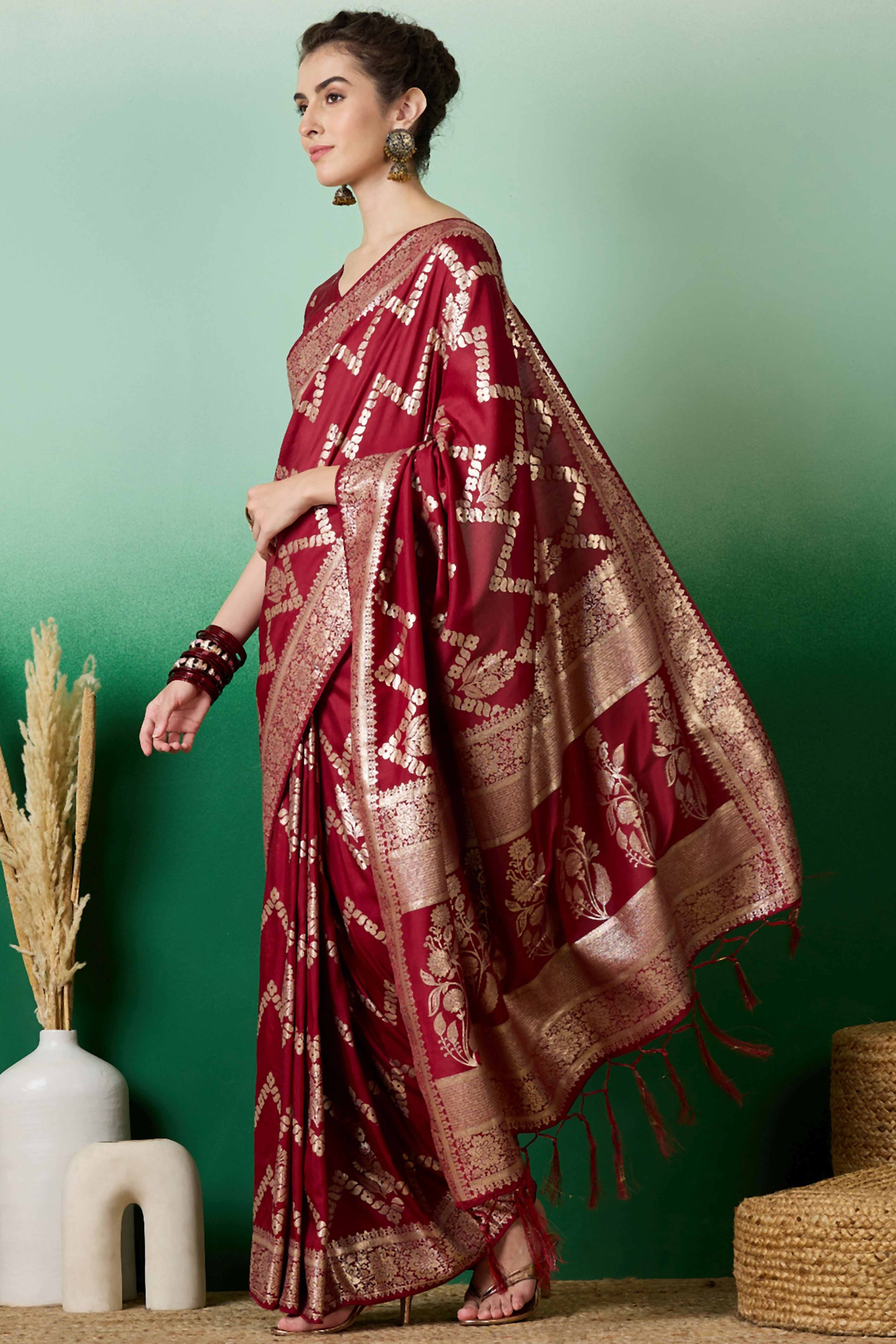 Maroon Cotton Blend Jacquard Saree Adorned With Floral Weaving & Graceful Tassel Pallu