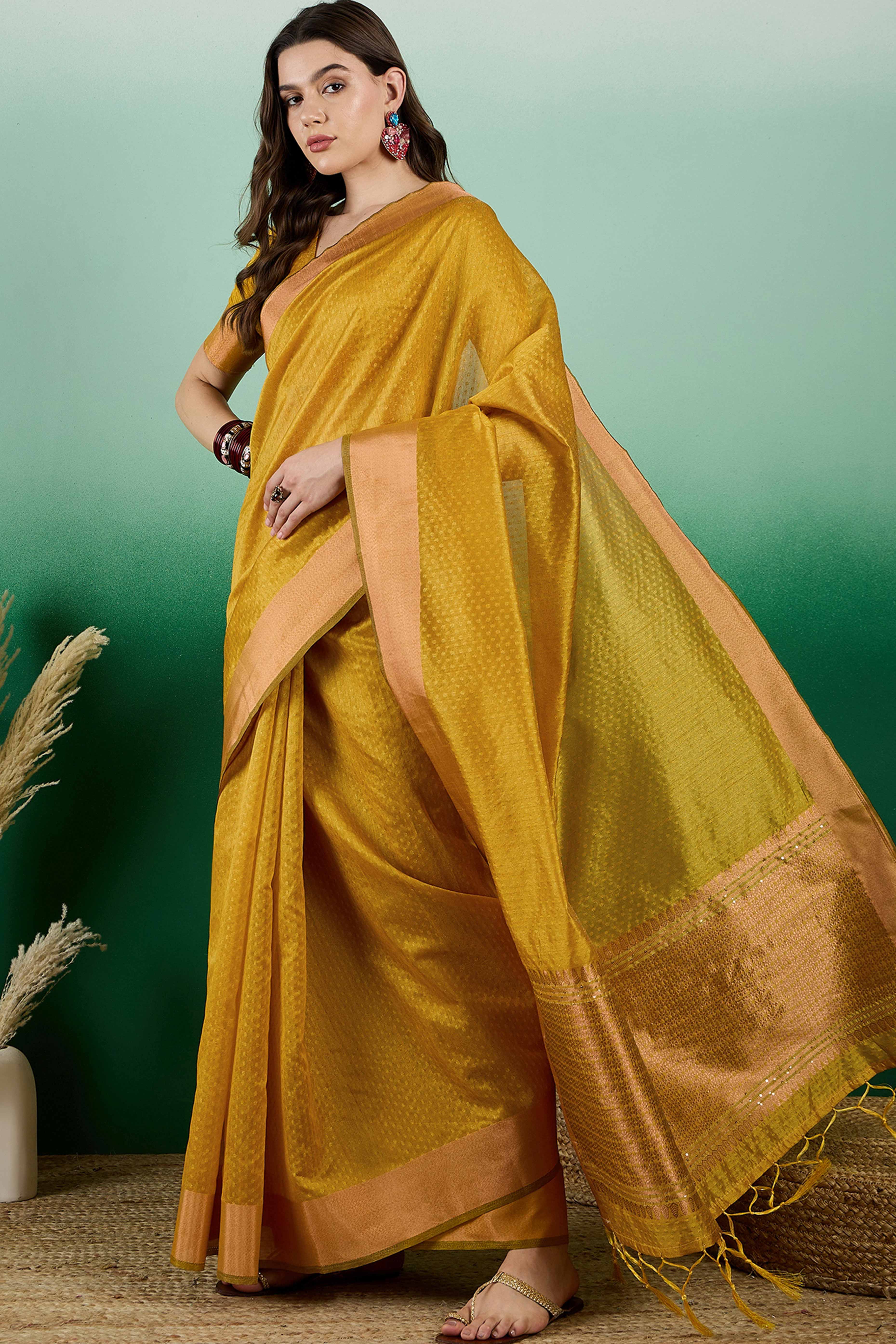 Mustard Khadi Organza Saree Intricate Weaving & Sparkling Sequins with Tassel Pallu