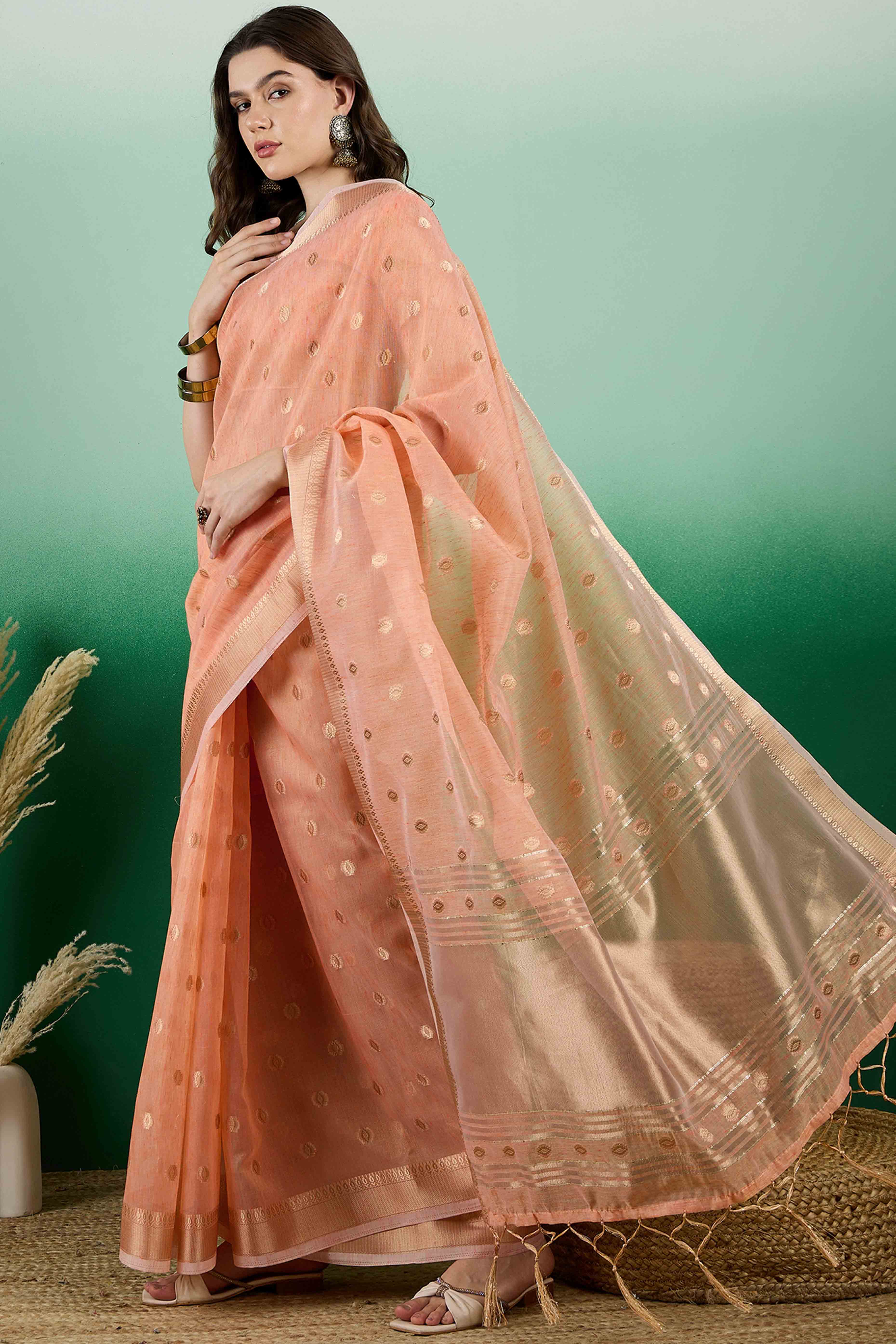Orange Khadi Organza Saree Embellished With Traditional Zari Work & Tassels