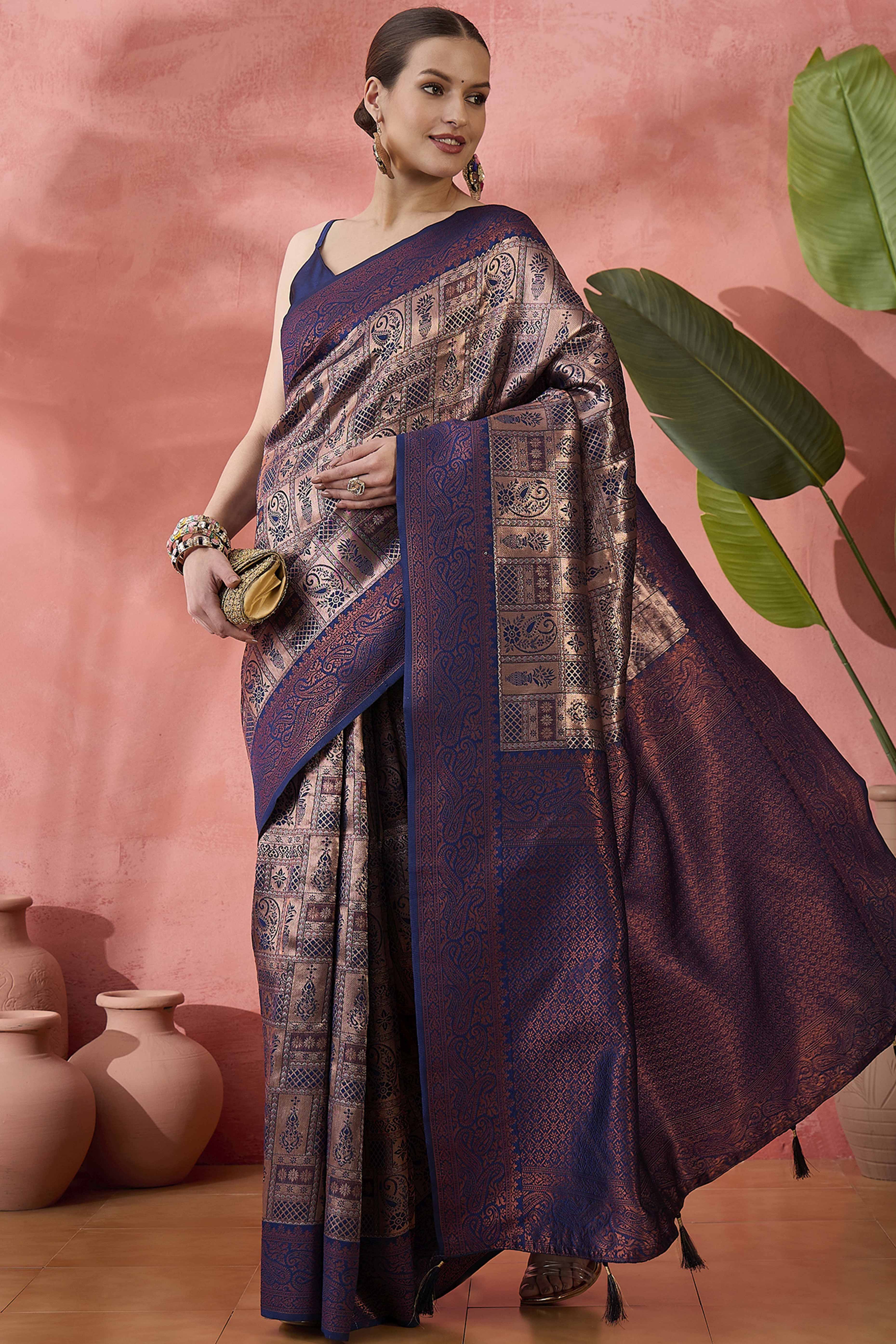 Navy Blue Woven Poly Silk Blend Saree Featuring Floral & Paisley Motifs With Tassel Accents