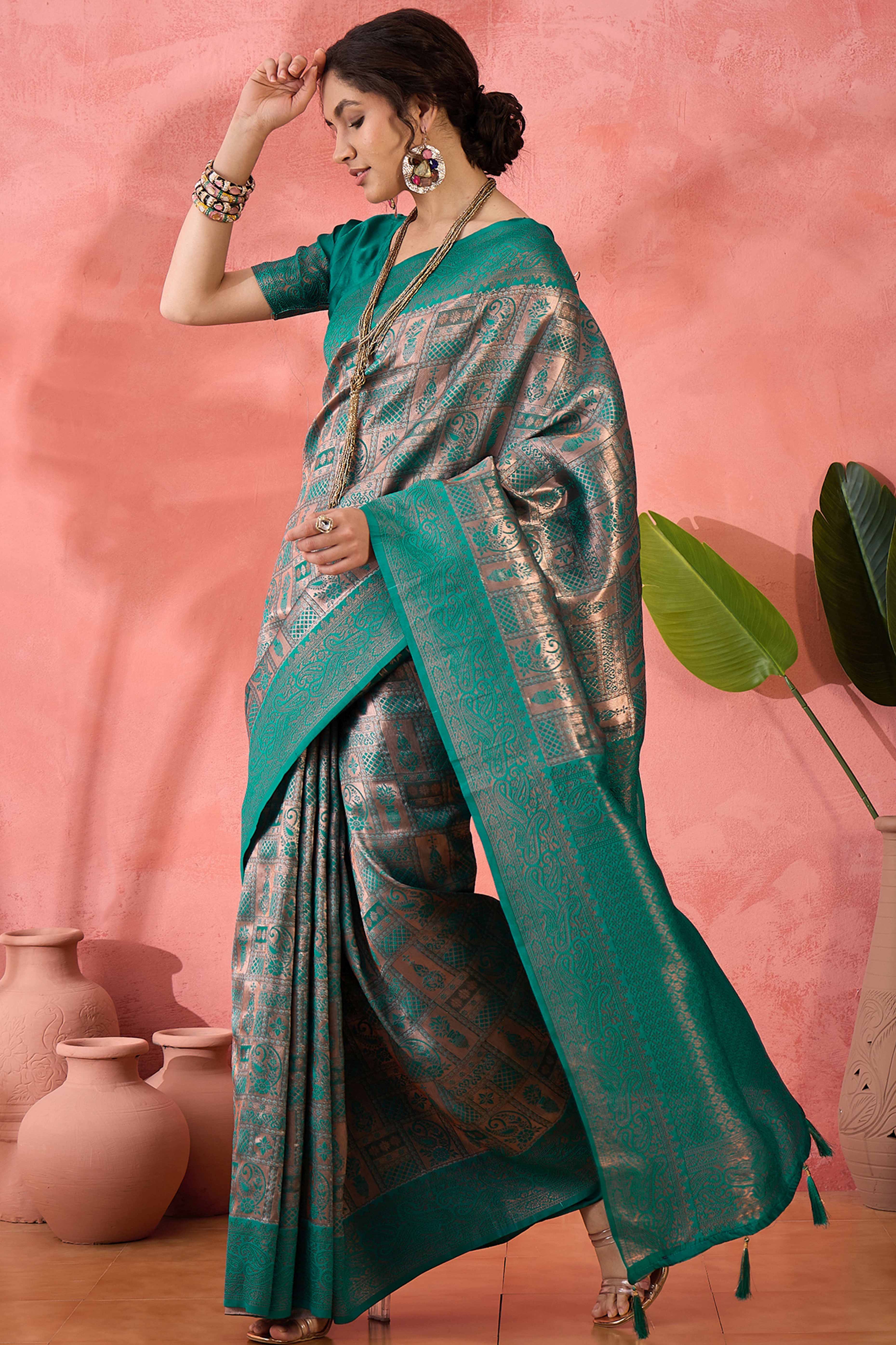 Rama Green Woven Poly Silk Blend Saree Featuring Floral & Paisley Motifs With Tassel Accents