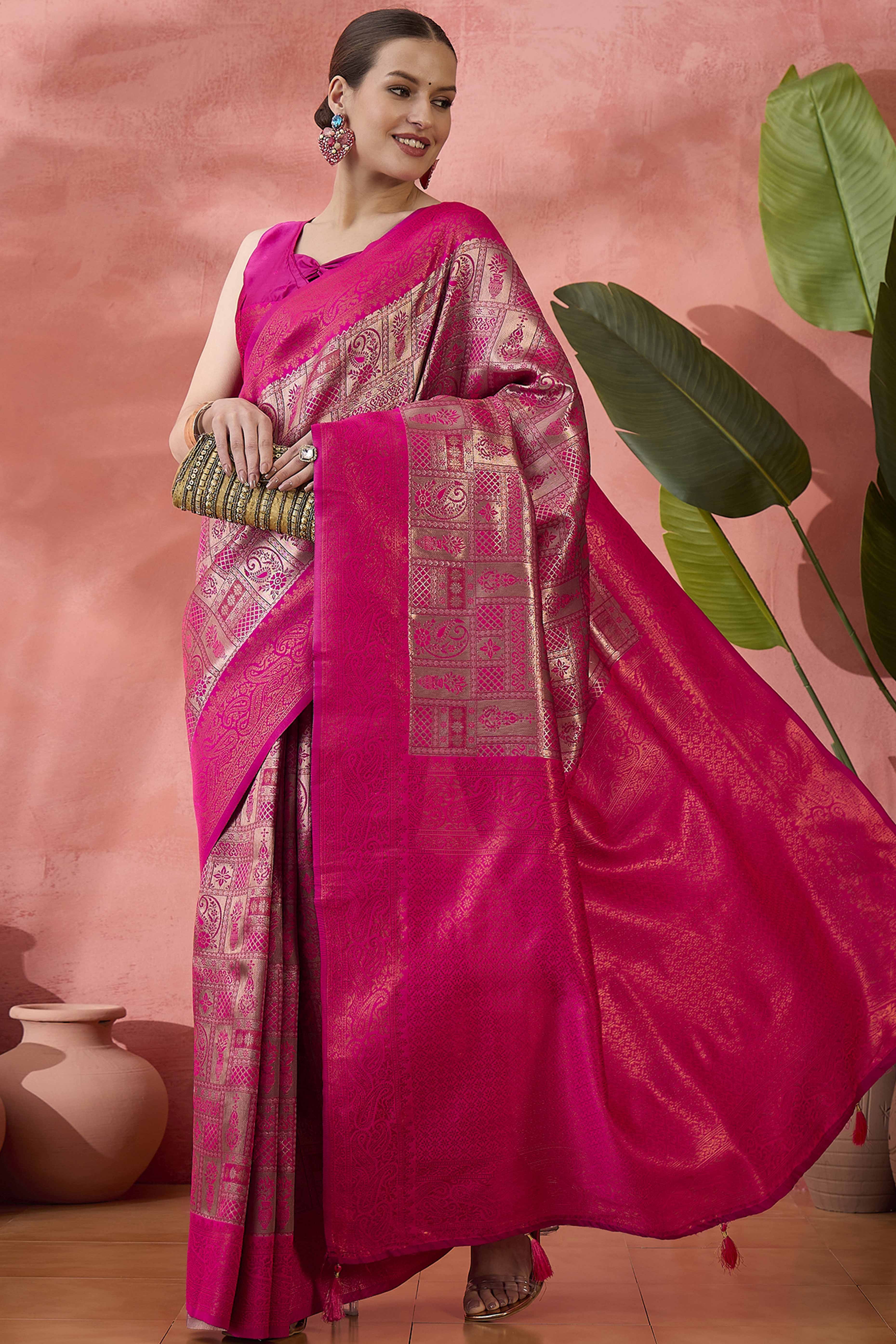 Rani Pink Woven Poly Silk Blend Saree Featuring Floral & Paisley Motifs With Tassel Accents