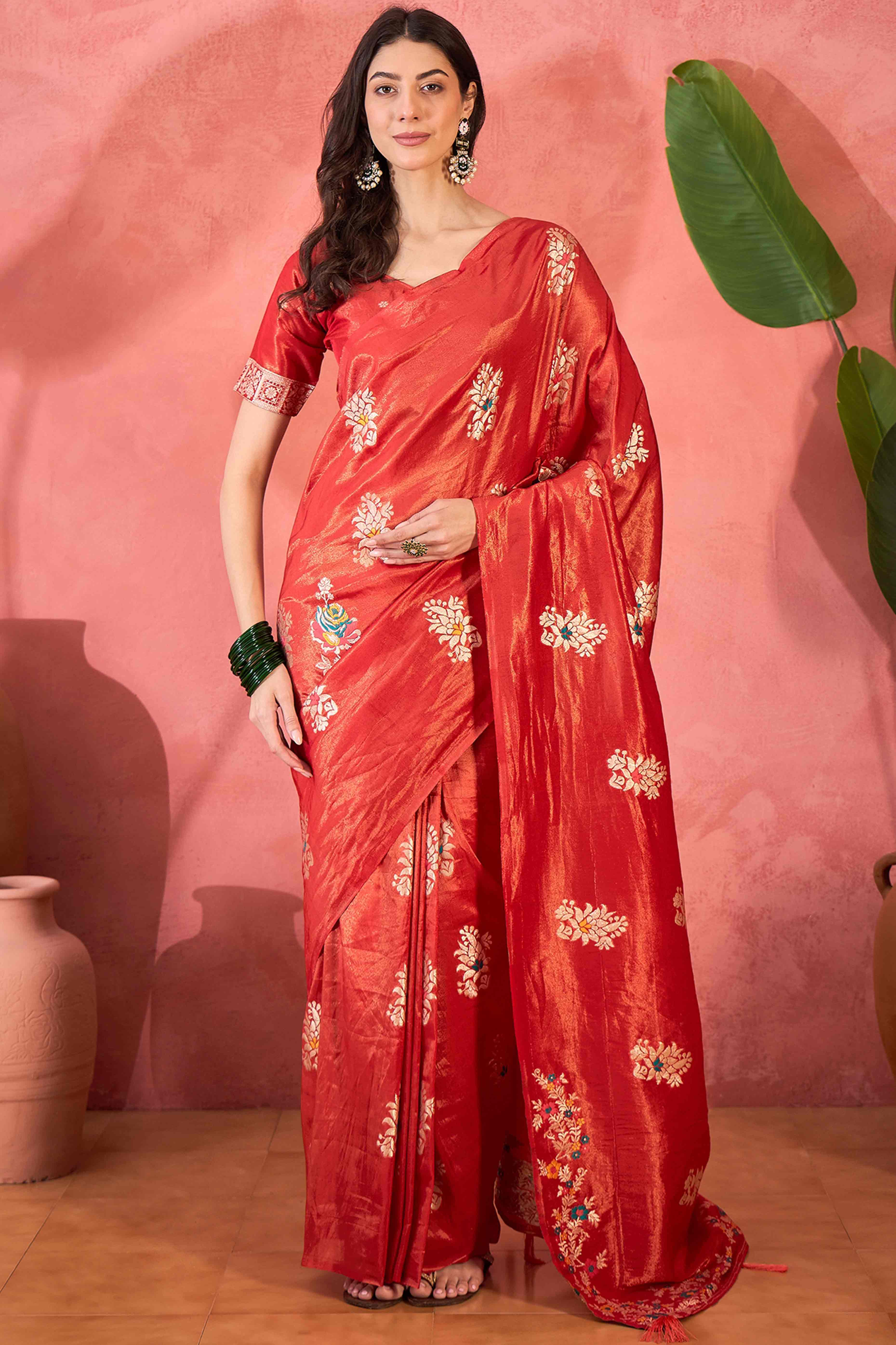 Red Shimmer Saree Showcasing Floral Zari Weaving & A Tasselled Pallu