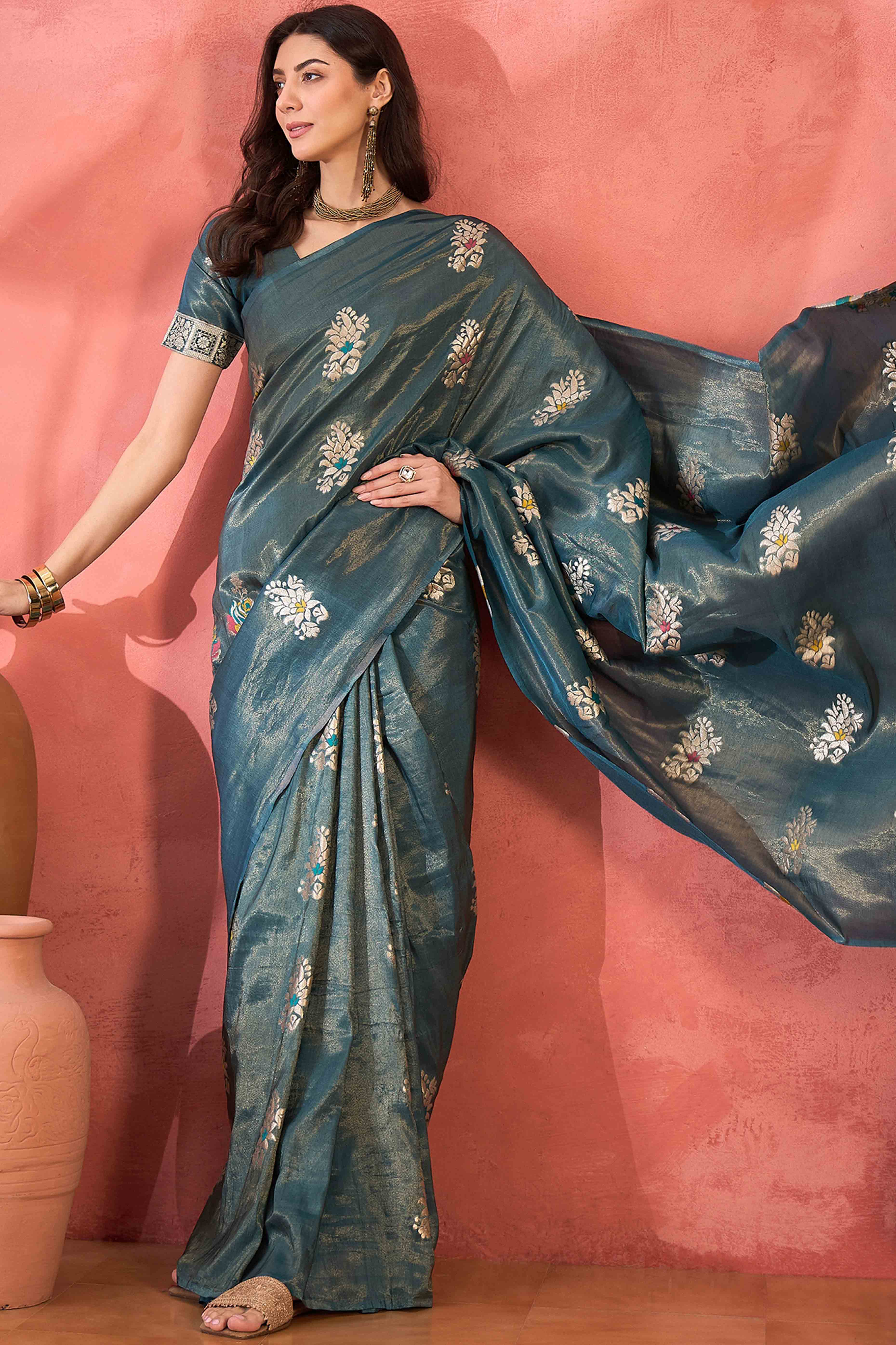 Teal Shimmer Saree Showcasing Floral Zari Weaving & A Tasselled Pallu