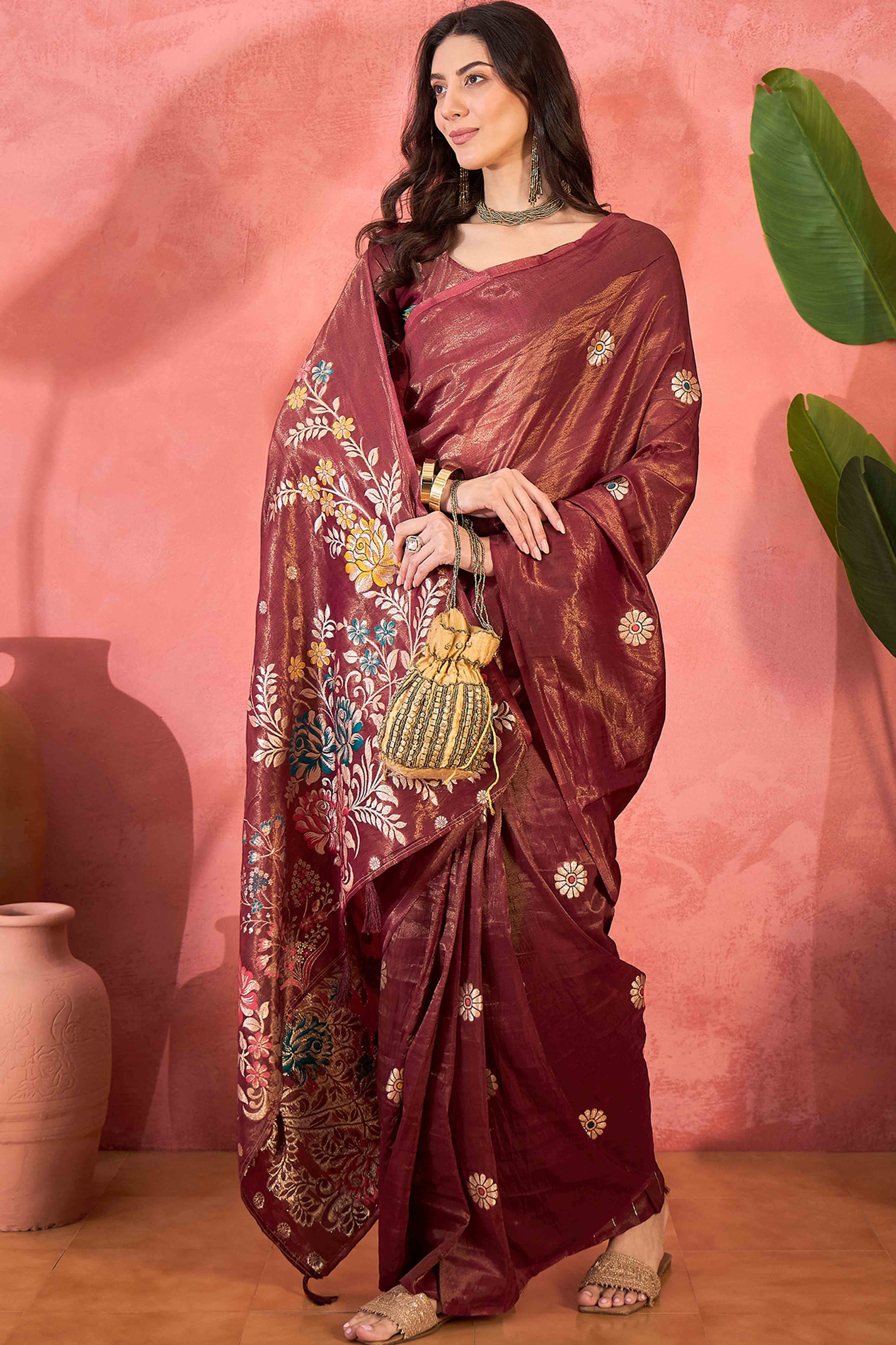 Maroon Shimmer Saree Adorned with Floral Zari Weaving & Tassel Pallu