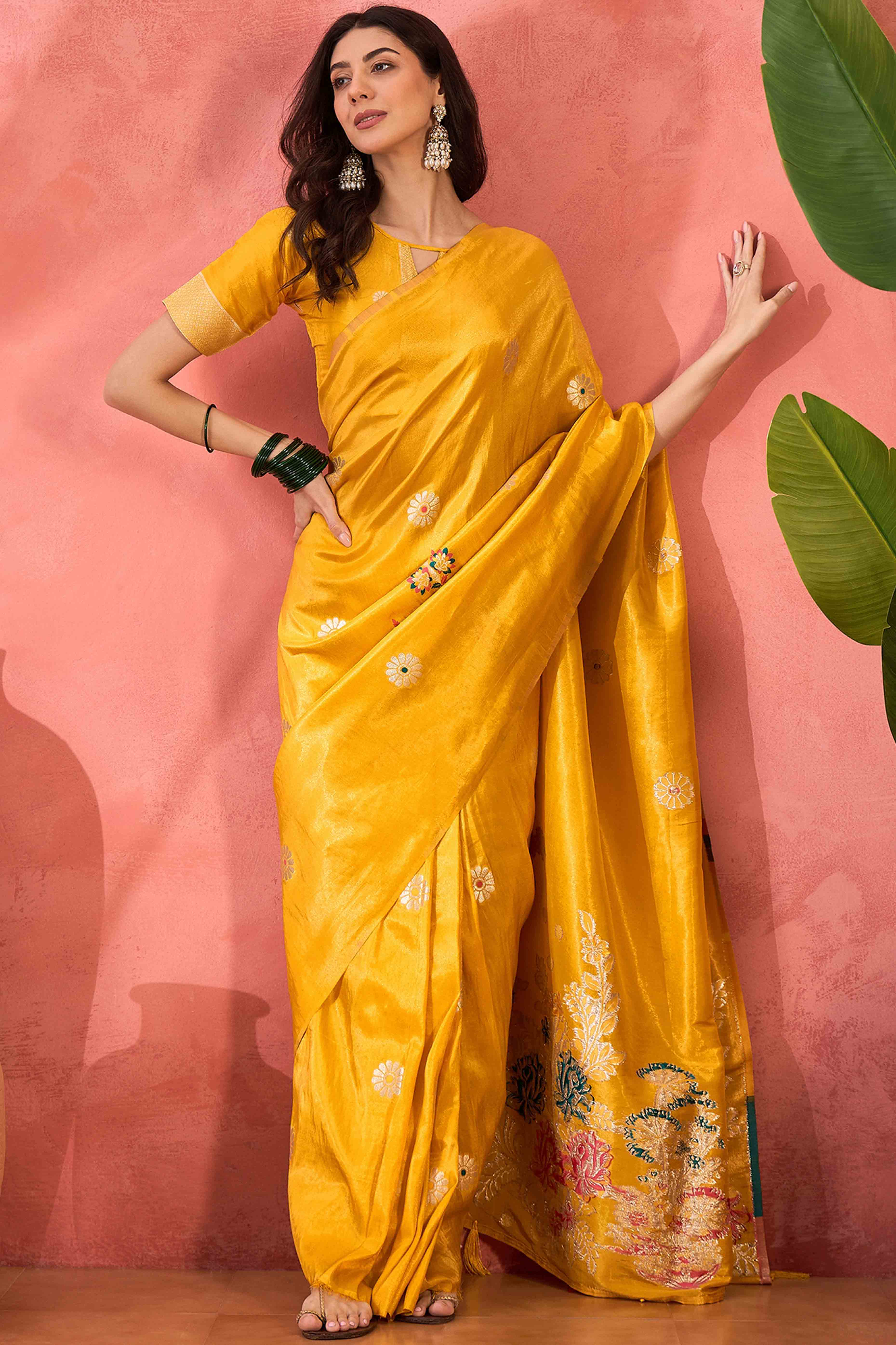 Yellow Shimmer Saree Adorned with Floral Zari Weaving & Tassel Pallu