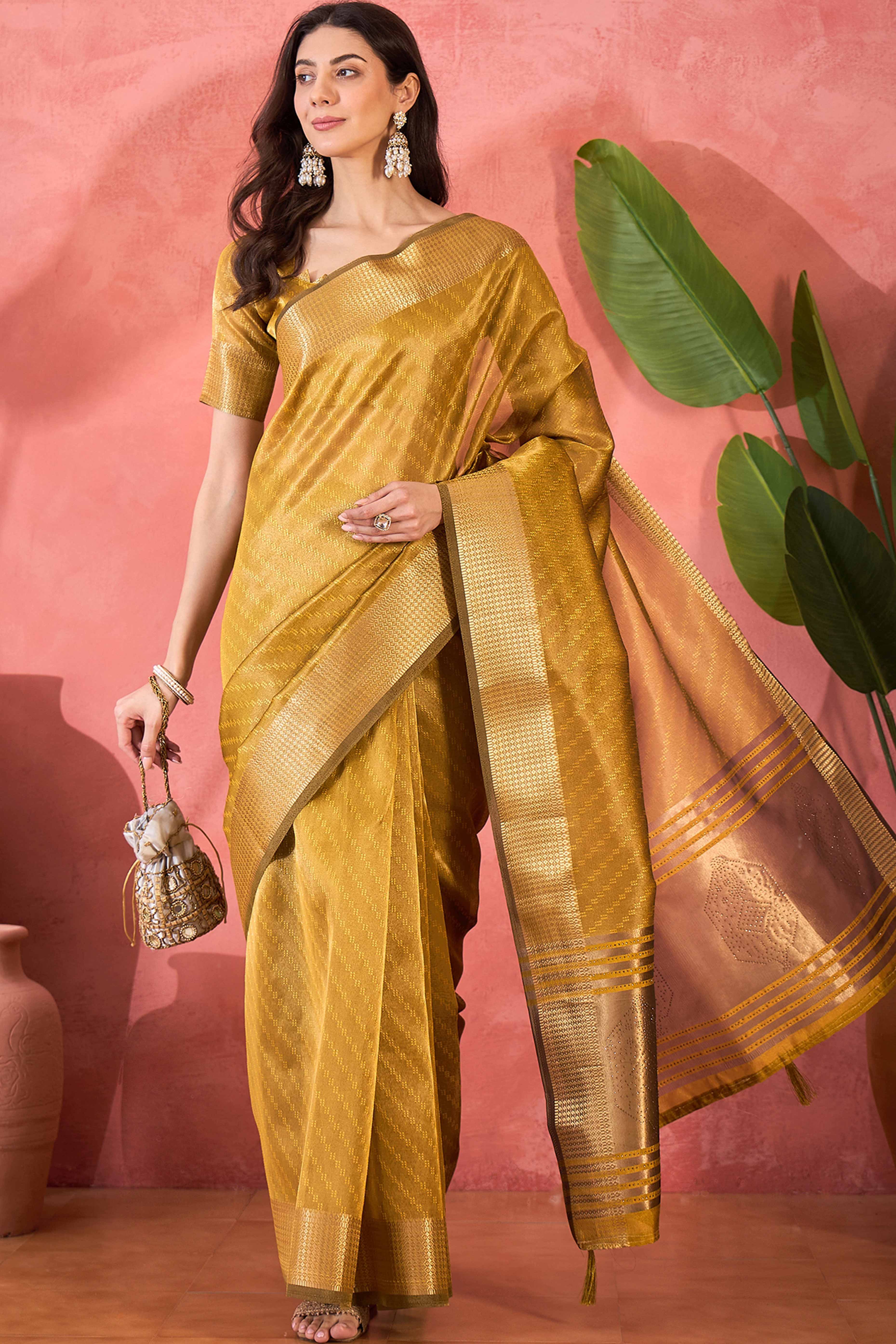 Mustard Khadi Organza Saree Intricate Weaving & Sparkling Stonework With Tassel Pallu