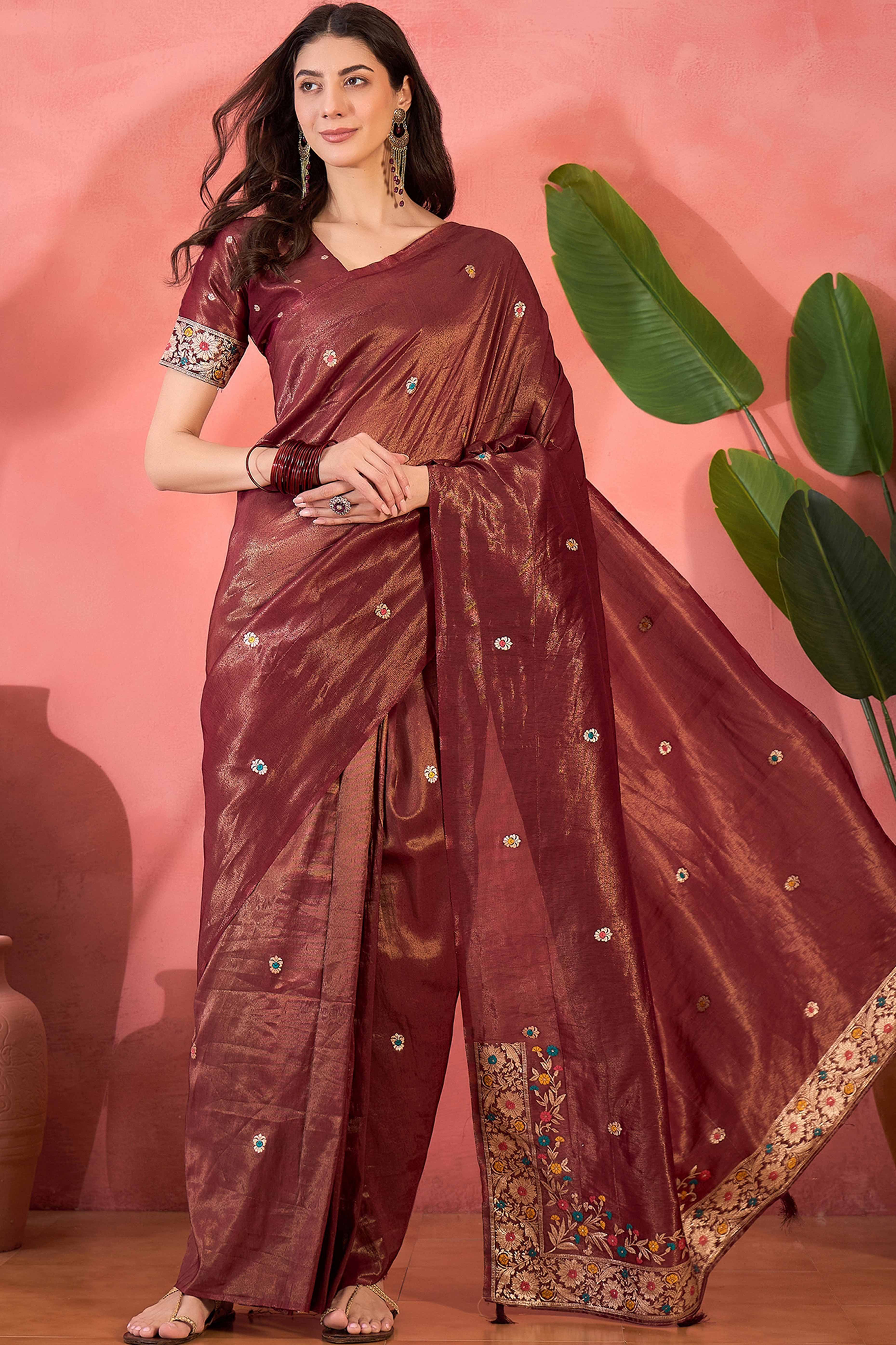 Maroon Zari Woven Shimmer Saree With Floral Motifs & Flowing Tassel Pallu