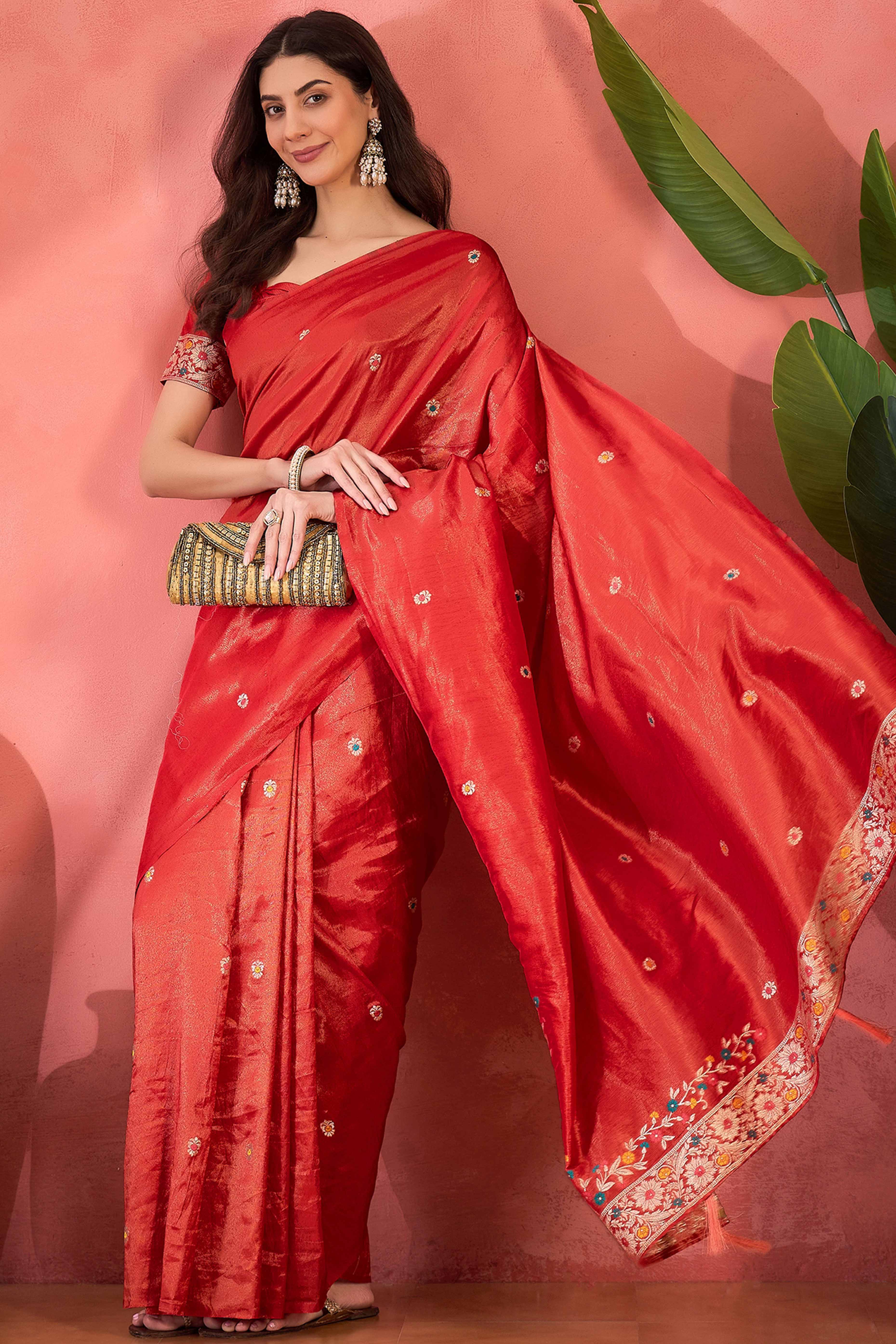 Red Zari Woven Shimmer Saree With Floral Motifs & Flowing Tassel Pallu