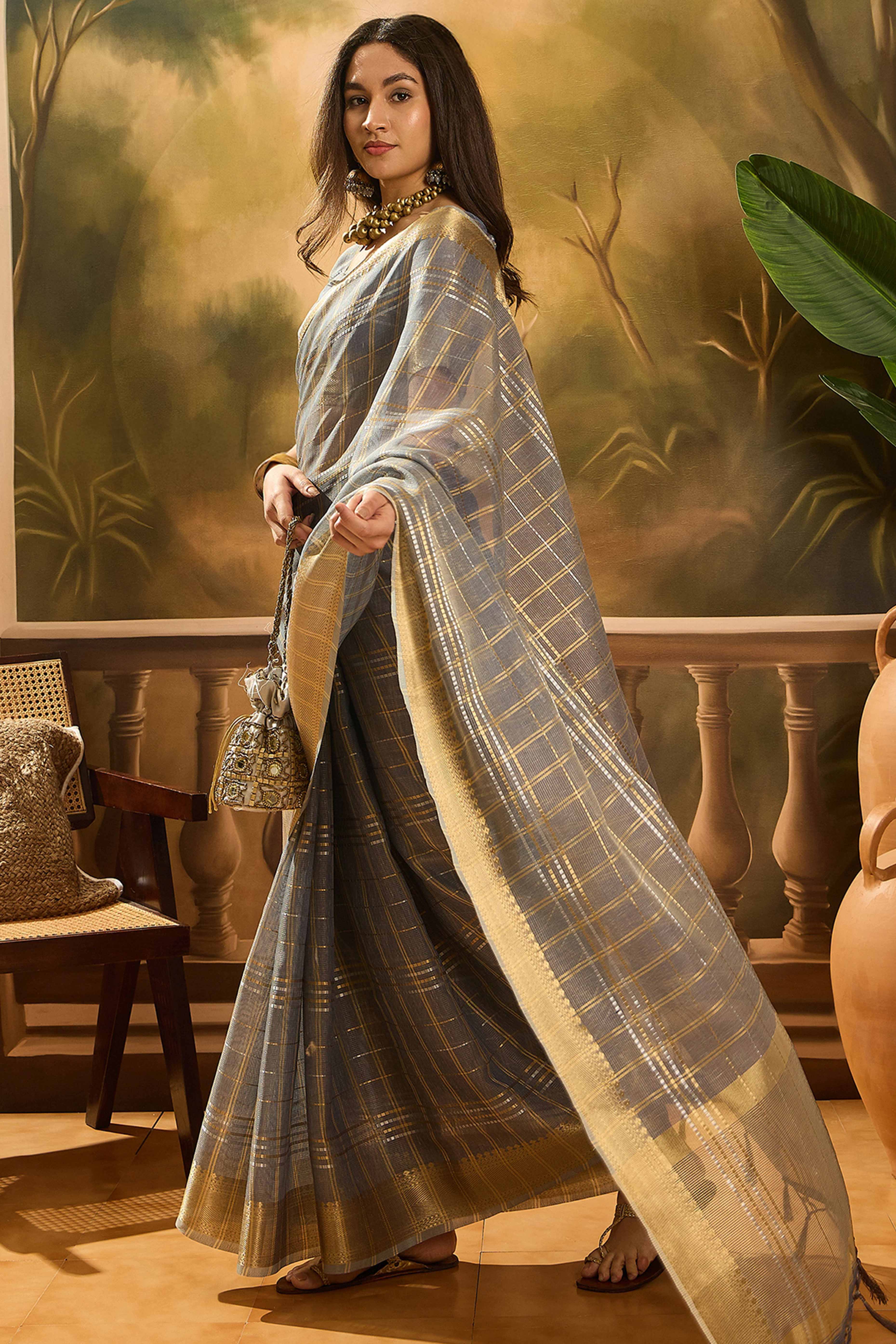 Grey Zari Woven Khadi Organza Saree Featuring Classic Checks & Tassel Detailing