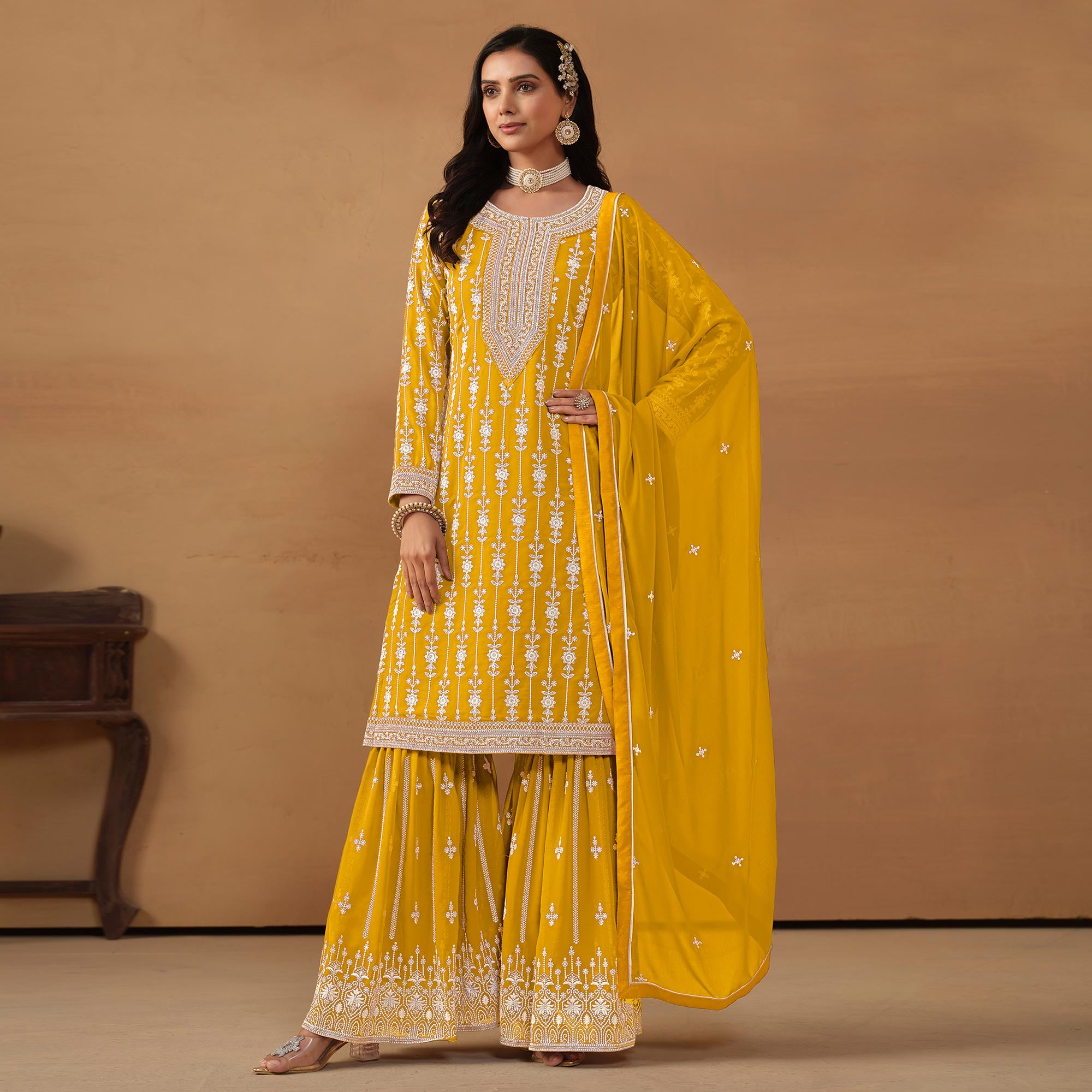 Yellow Floral Embroidered Georgette Semi Stithed Sharara Suit