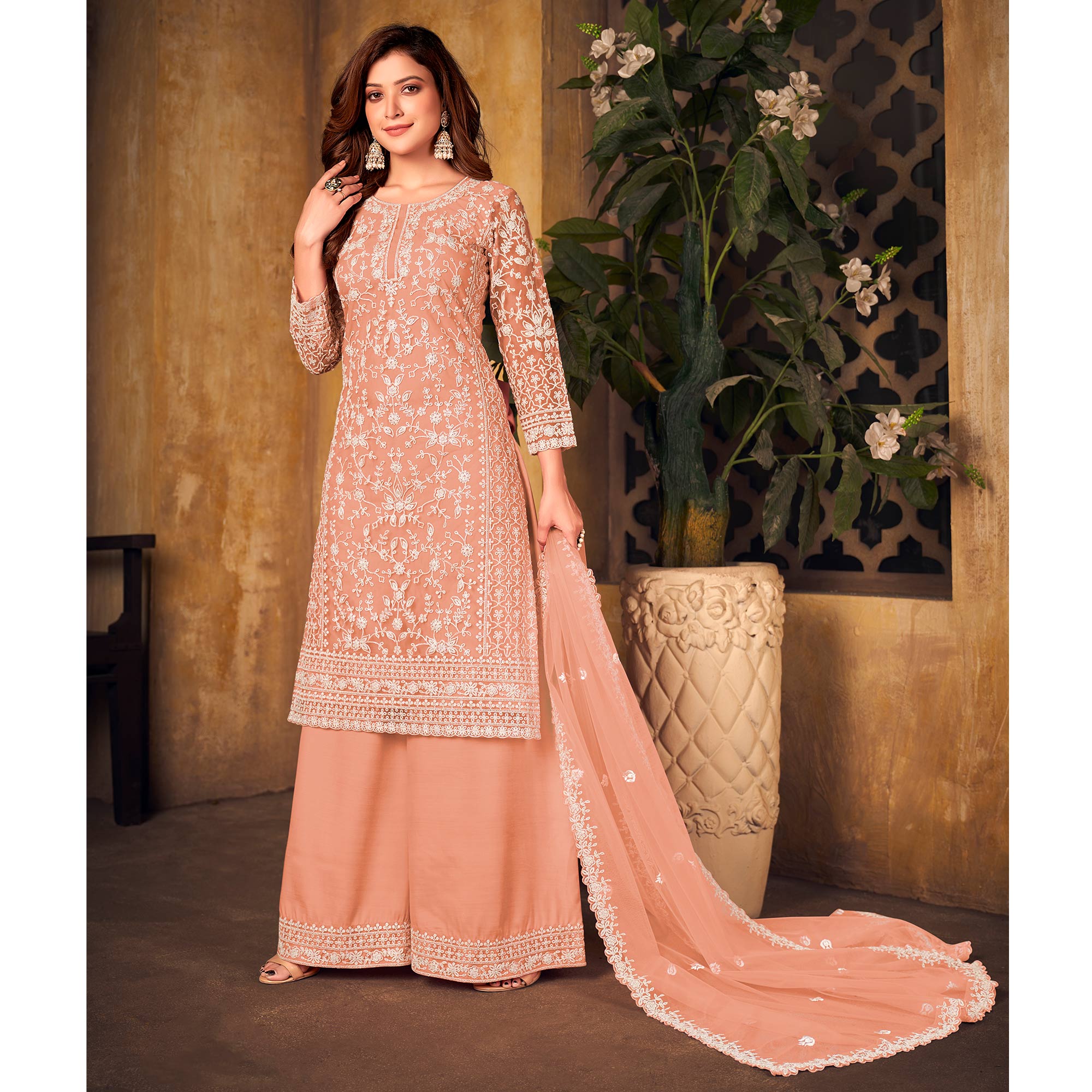 Peach Floral Embroidered Net Semi Stitched Suit