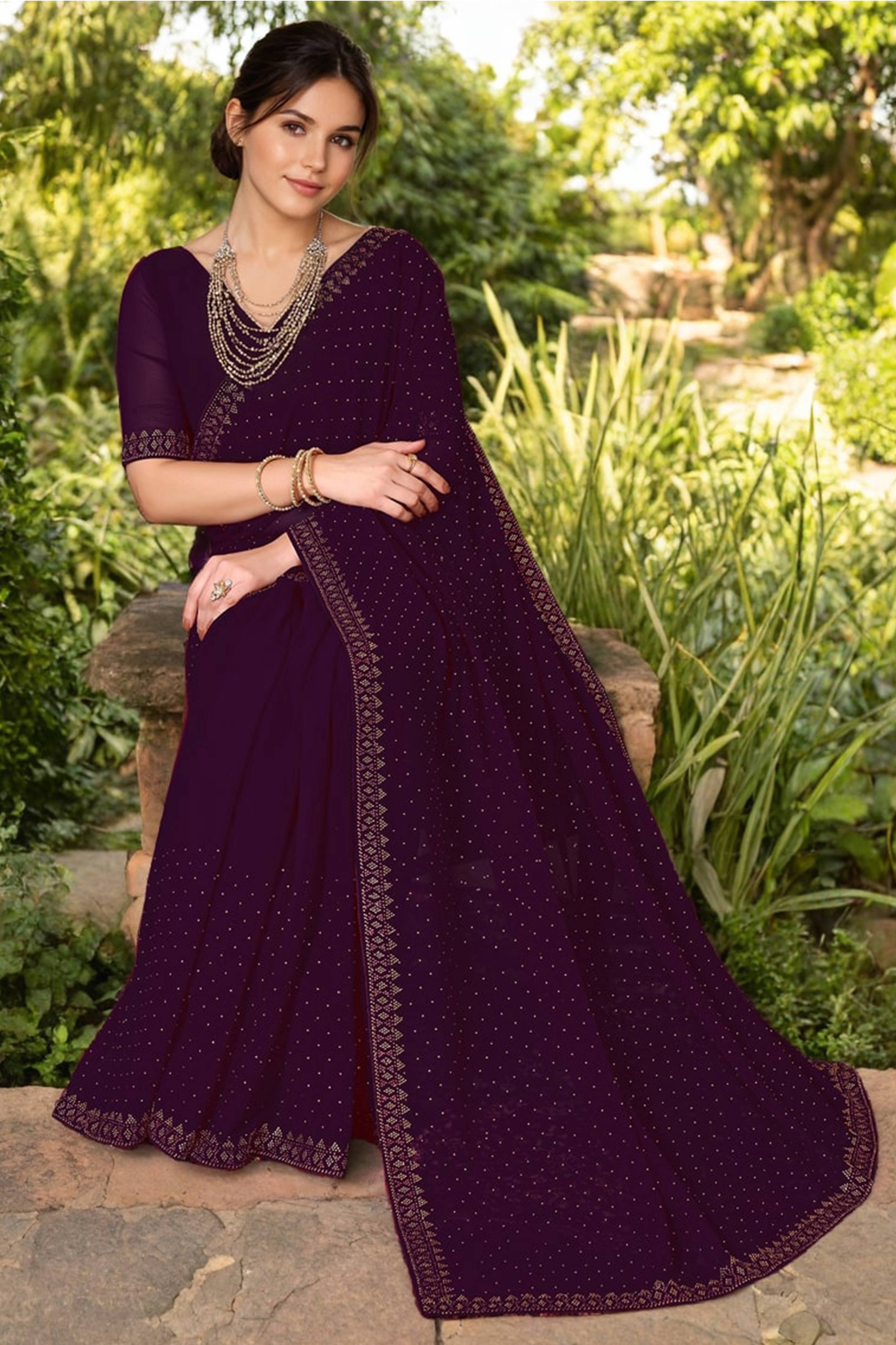 Wine Rangoli Dola Silk Saree Embellished With Diamond Work And Elegant Border