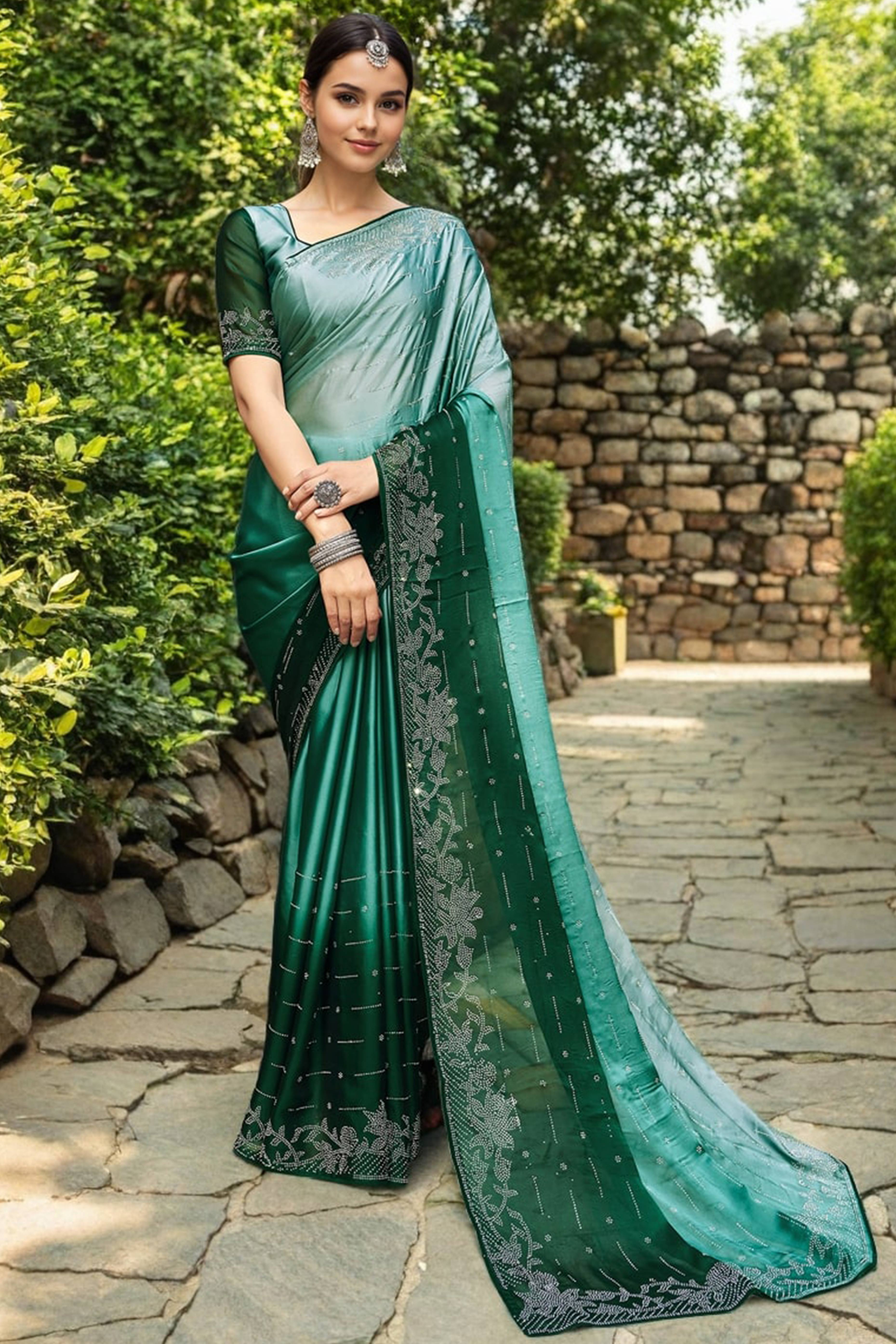 Green Rangoli Dola Silk Saree Adorned With Gleaming Swarovski Work & Classic Floral Border