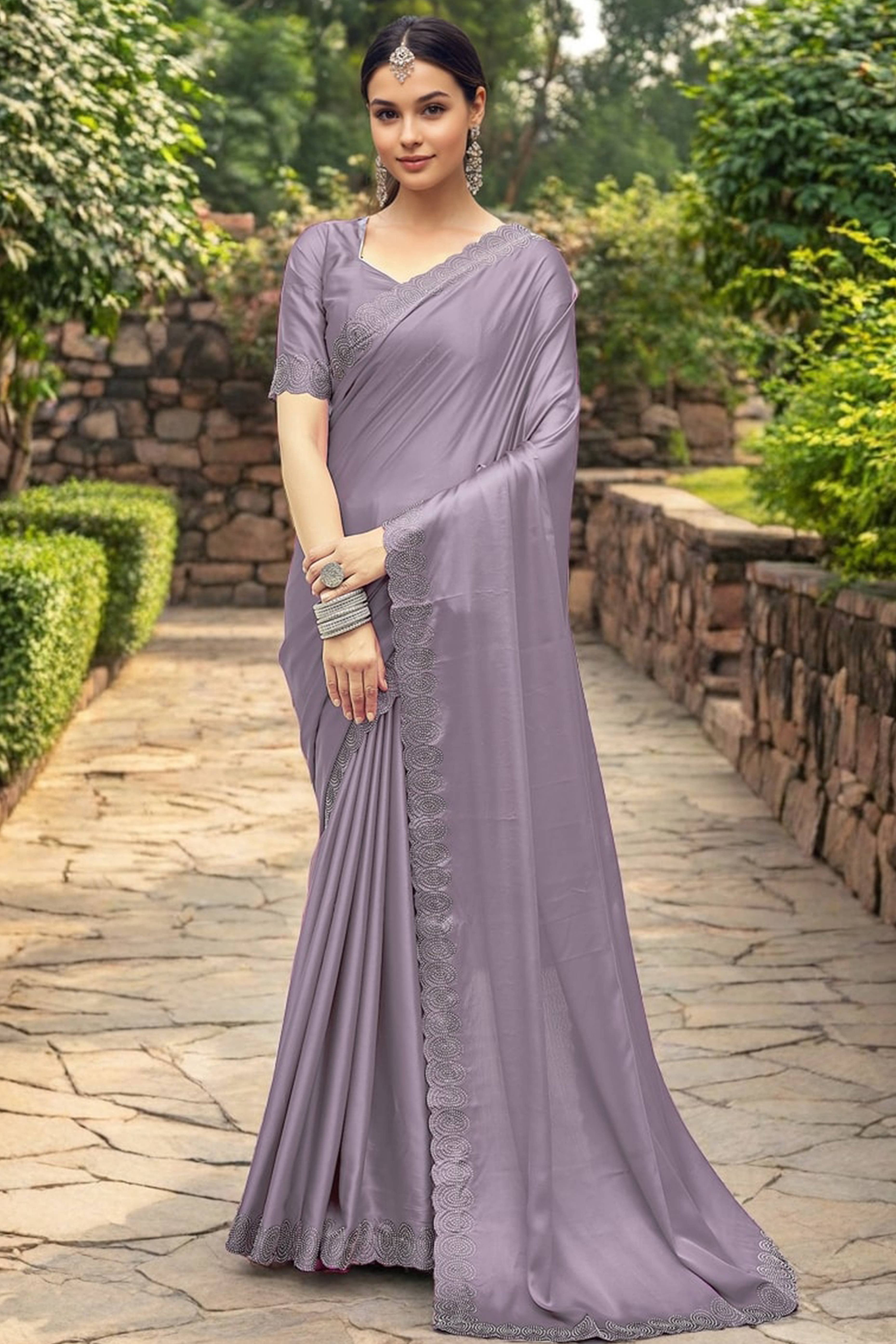 Lavender Solid Rangoli Dola Silk Saree Featuring Sparkling Swarovski Work Border