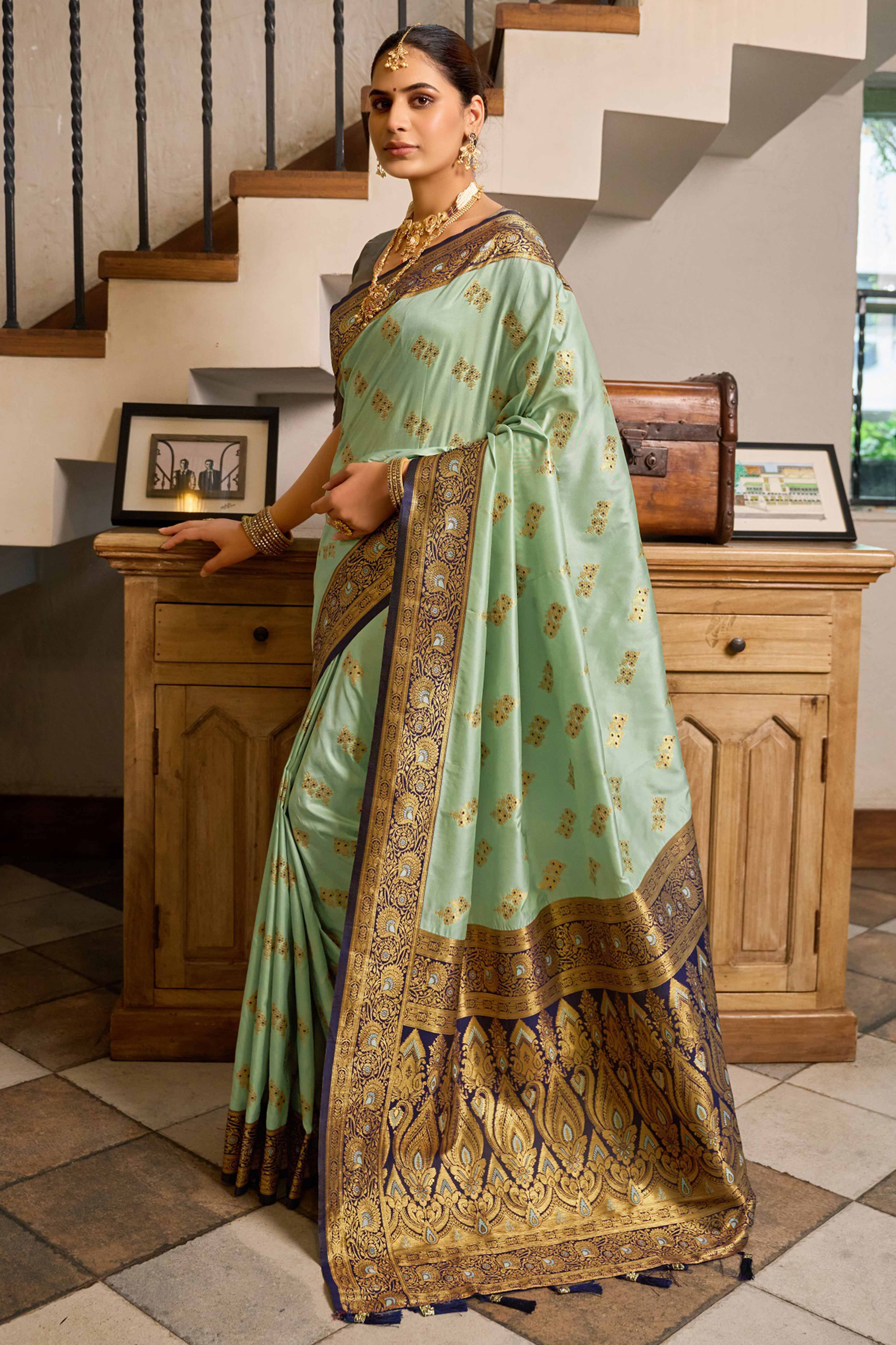 Sea Green Silk Blend Saree Featuring Intricate Floral Zari Work