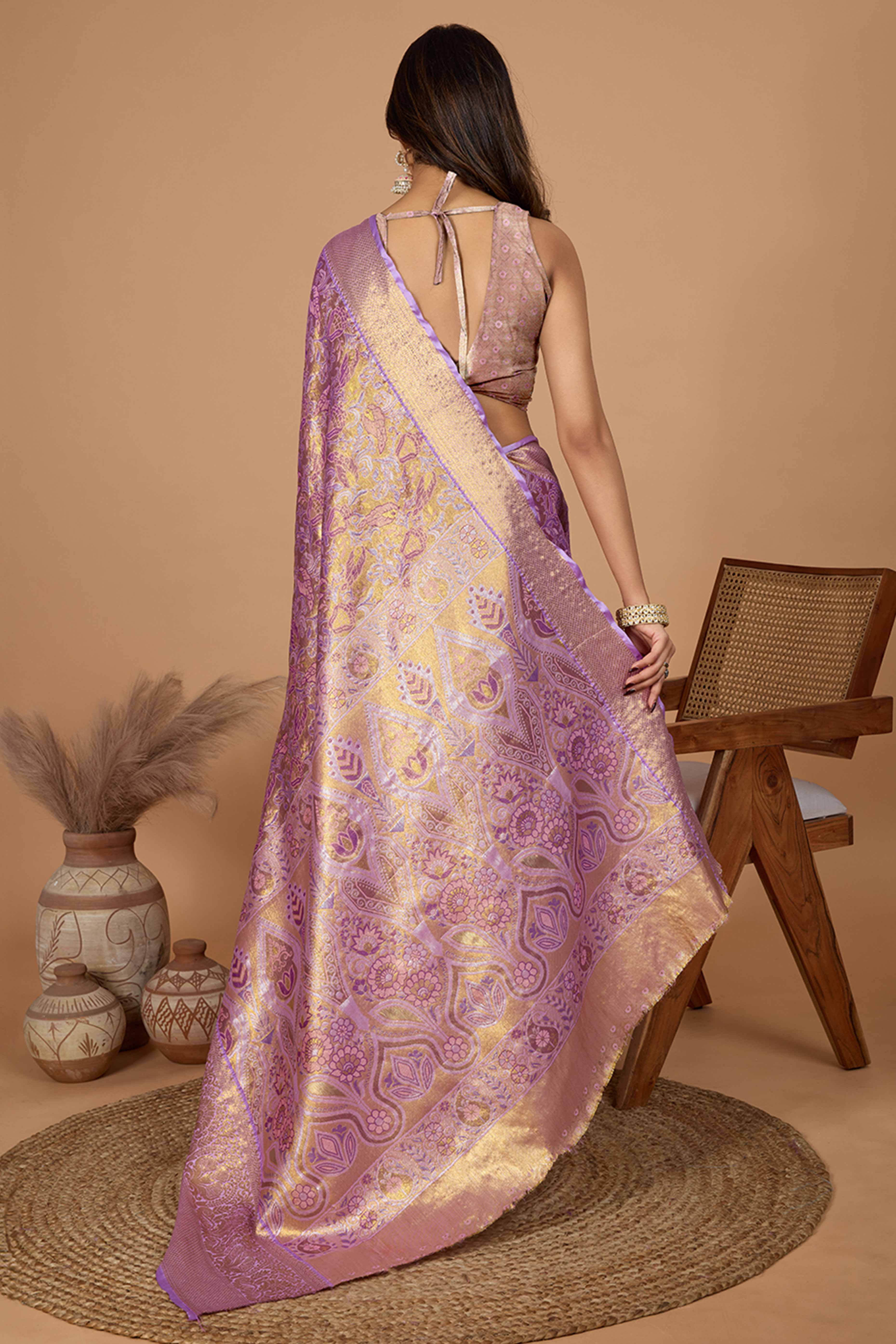 Purple Kanjivaram Silk Saree Adorned With Exquisite Floral Zari Weaving