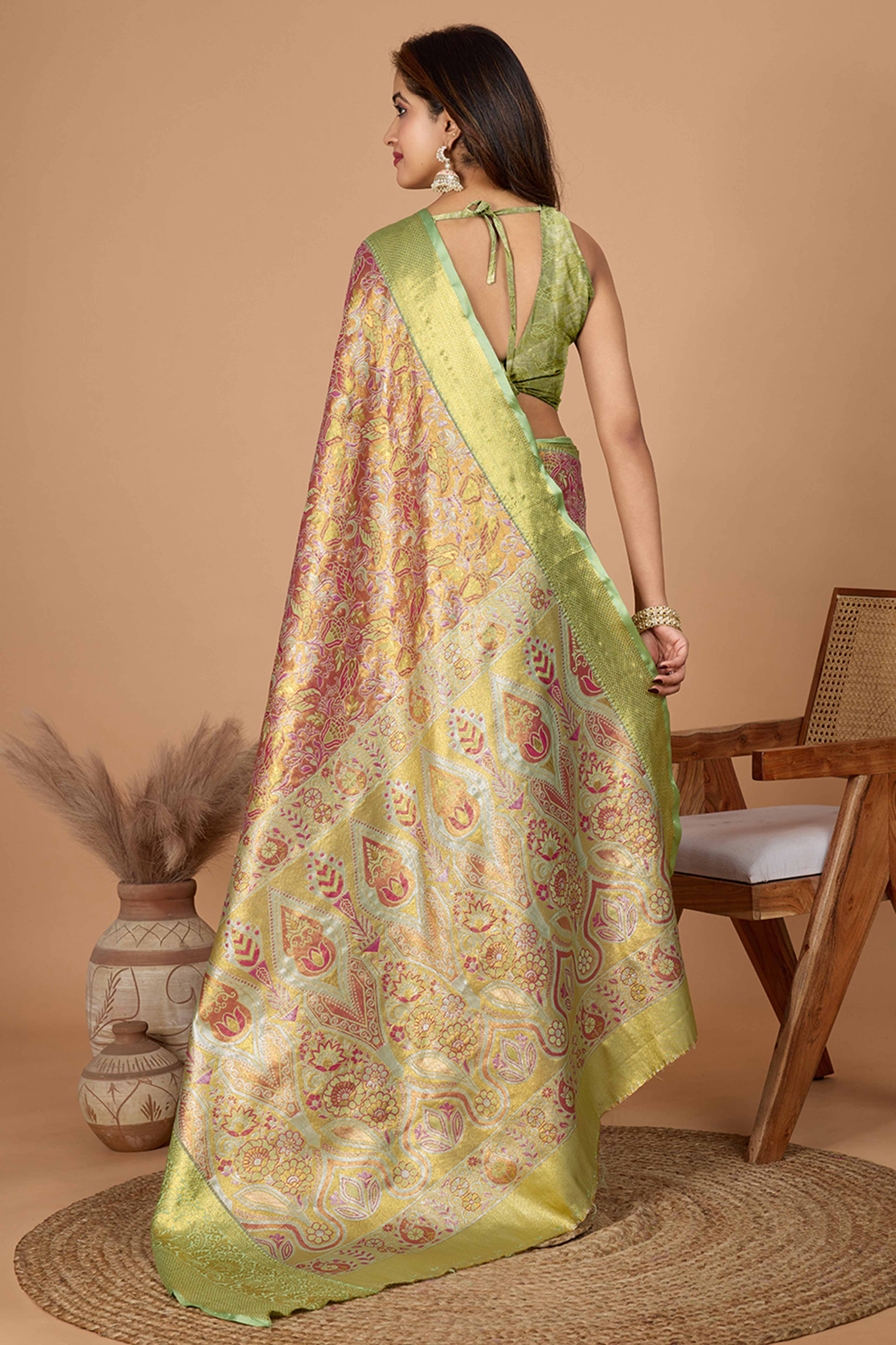 Green Kanjivaram Silk Saree Adorned With Exquisite Floral Zari Weaving