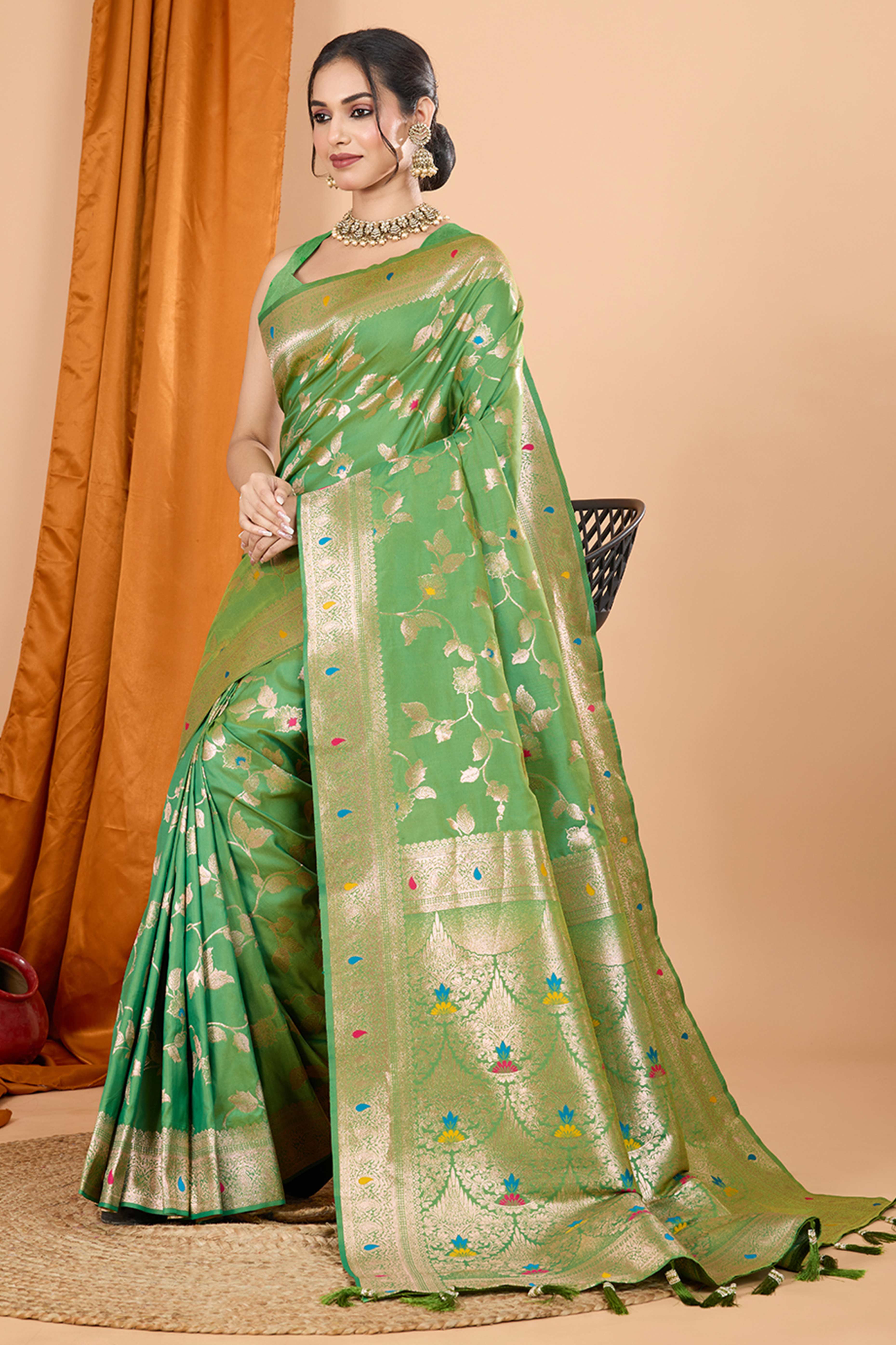 Green Banarasi Silk Saree With Exquisite Floral Zari Weaving and Elegant Tassels