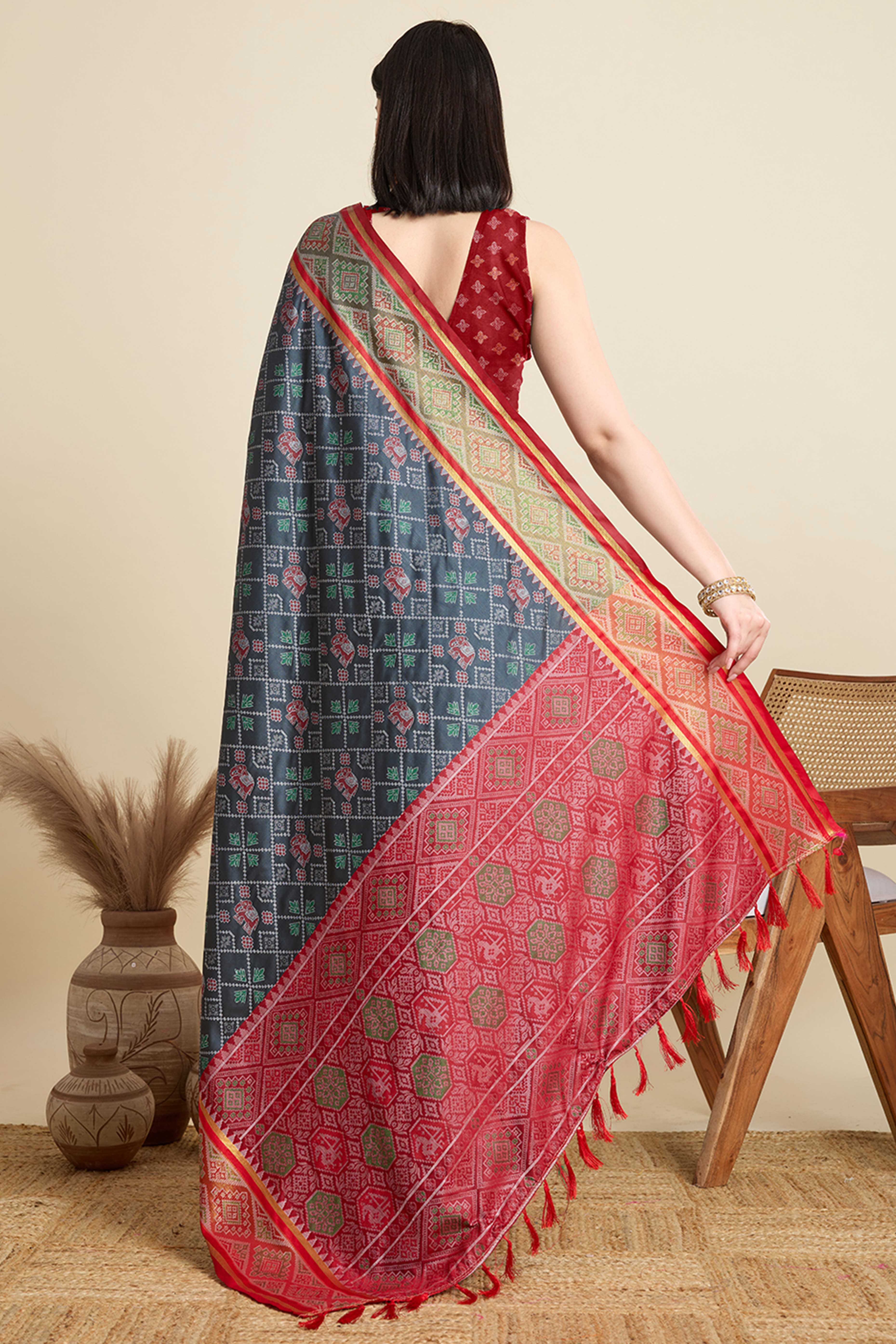 Grey Silk Blend Saree Featuring Patola Prints and a Detailed Weaving Border