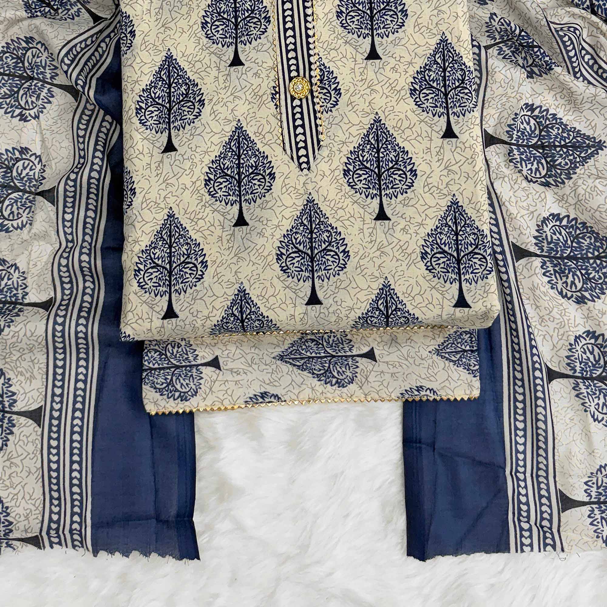 Vibrant Blue Leaf Printed Cotton Blend Dress Material Refined With Lace Border