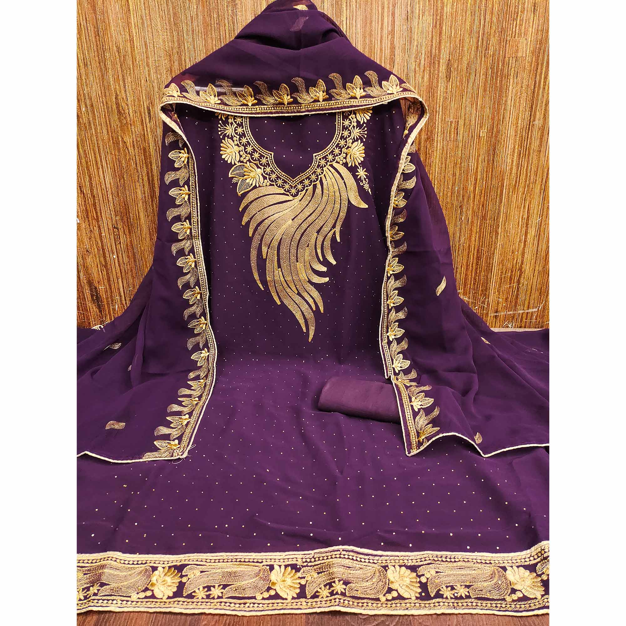 A Mesmerizing Creation Wine Floral Embroidery With Stone Work Georgette Dress Material