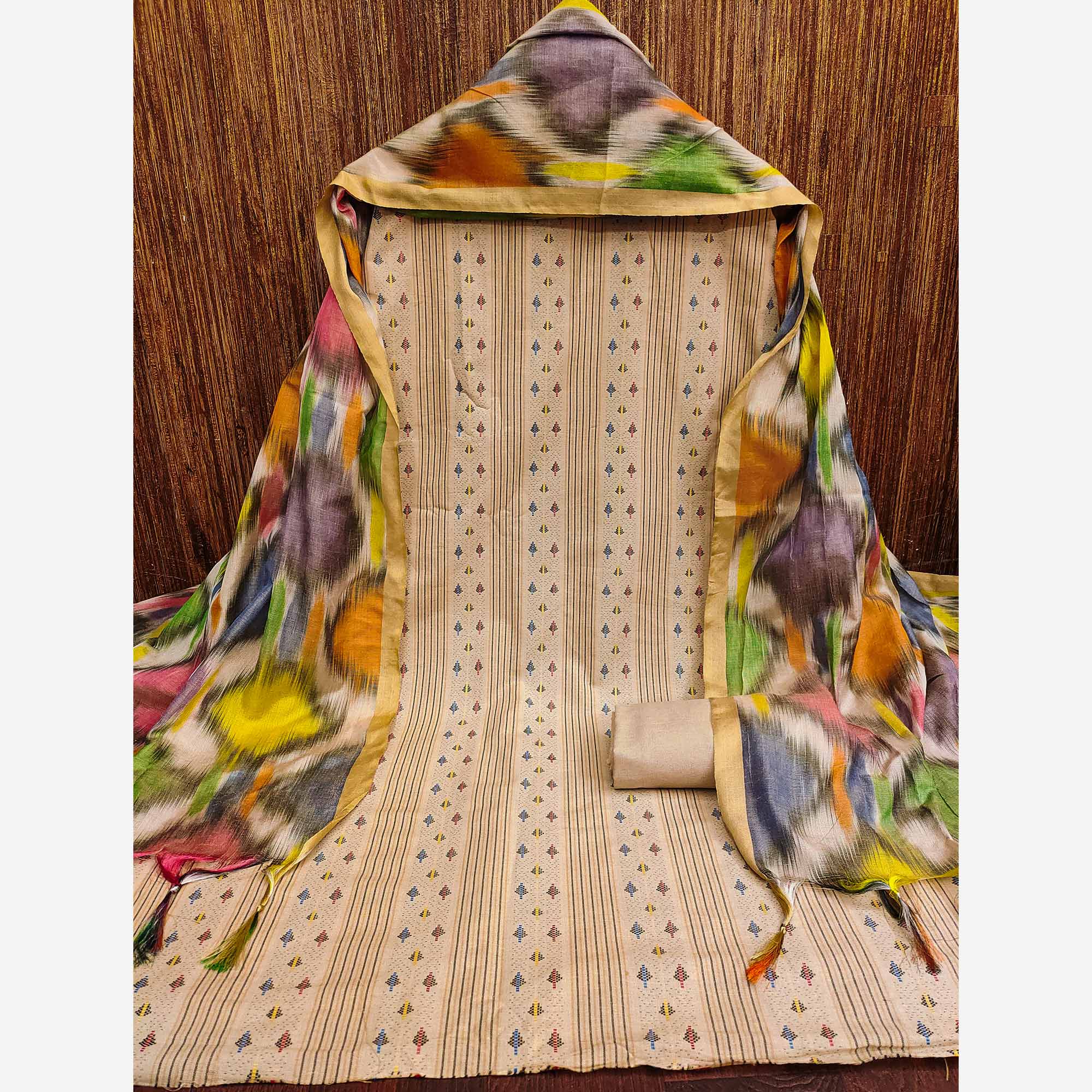 Make a Statement With Chikoo Woven Cotton Blend Dress Material
