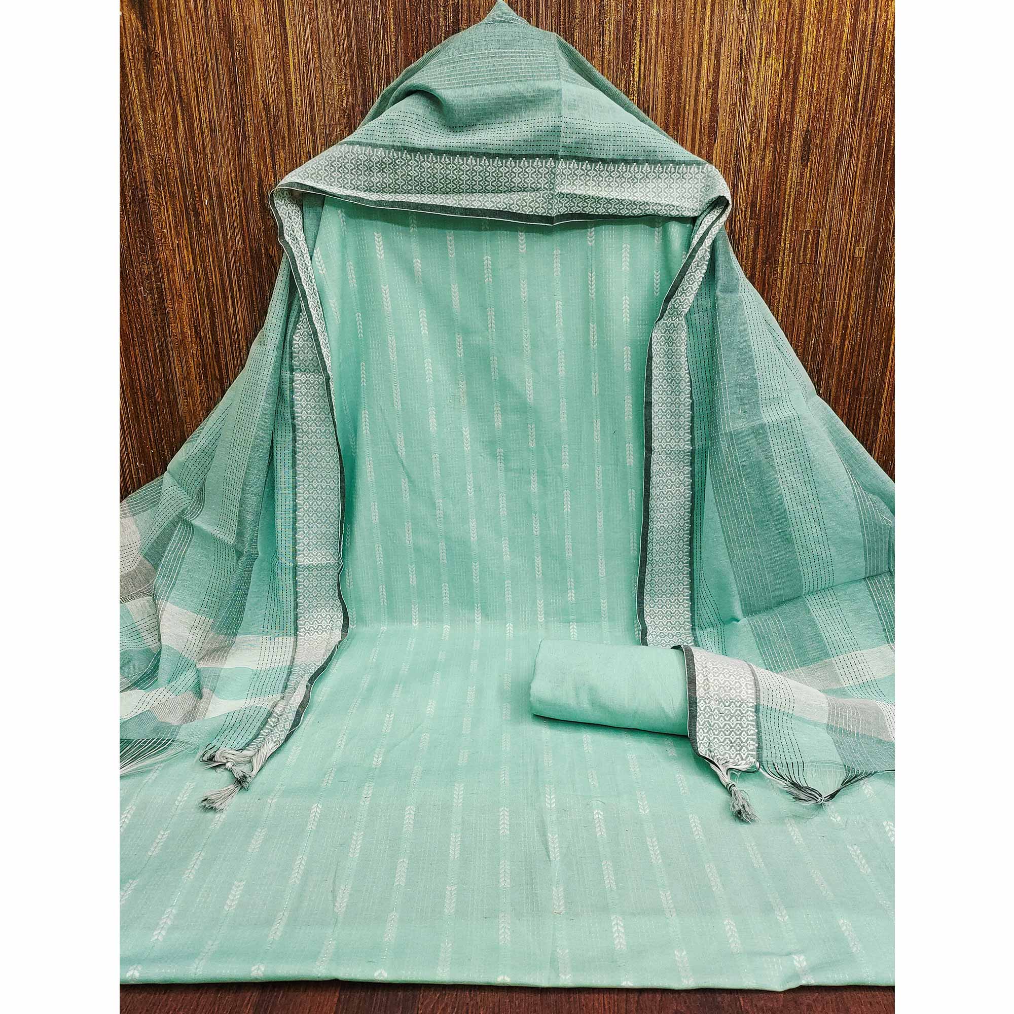 Refreshing Turquoise Woven Texture Dress Material In Poly Cotton Blend