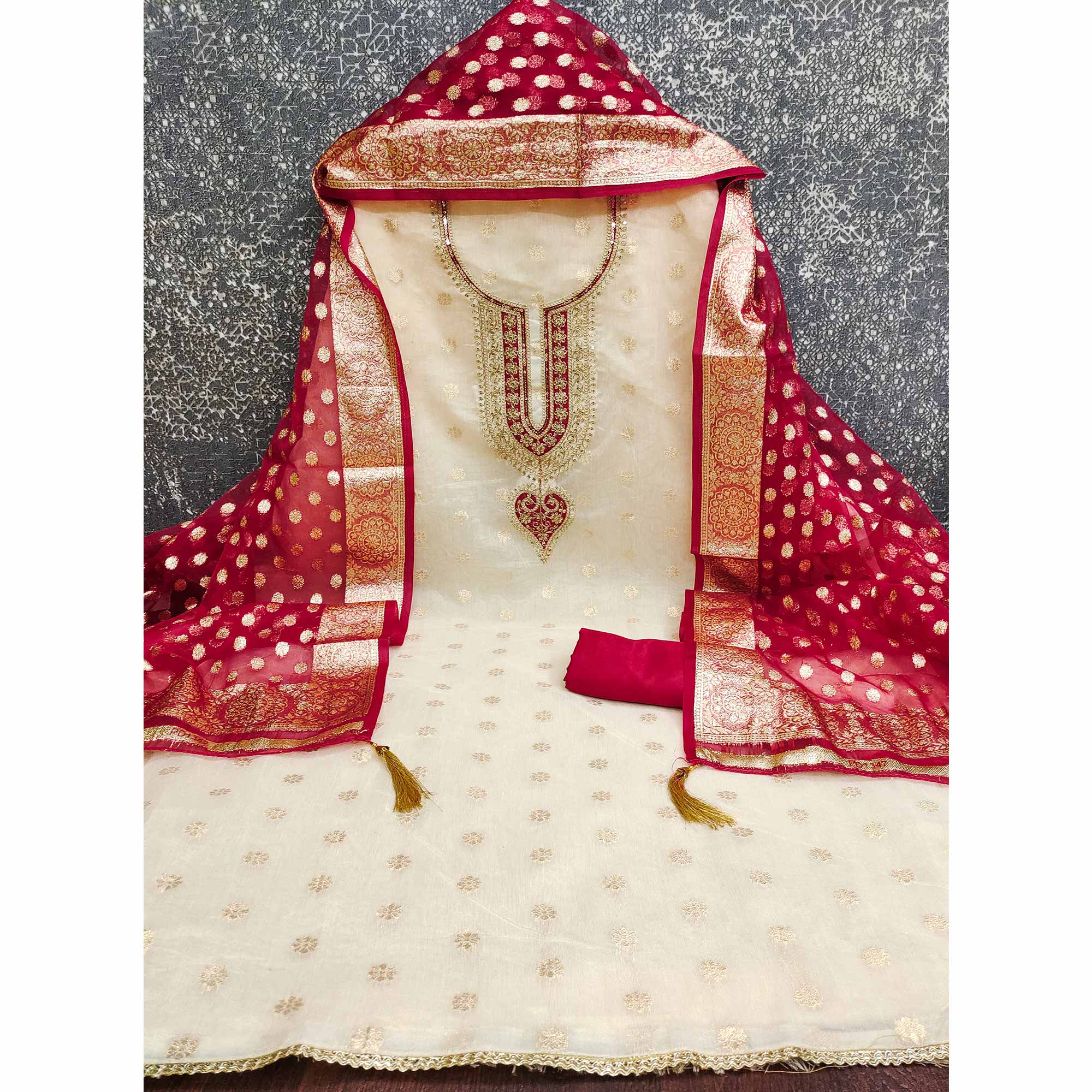 Graceful Cream & Red Butti Weaving Shimmer Dress Material Adorned With Cording Embroidery Work