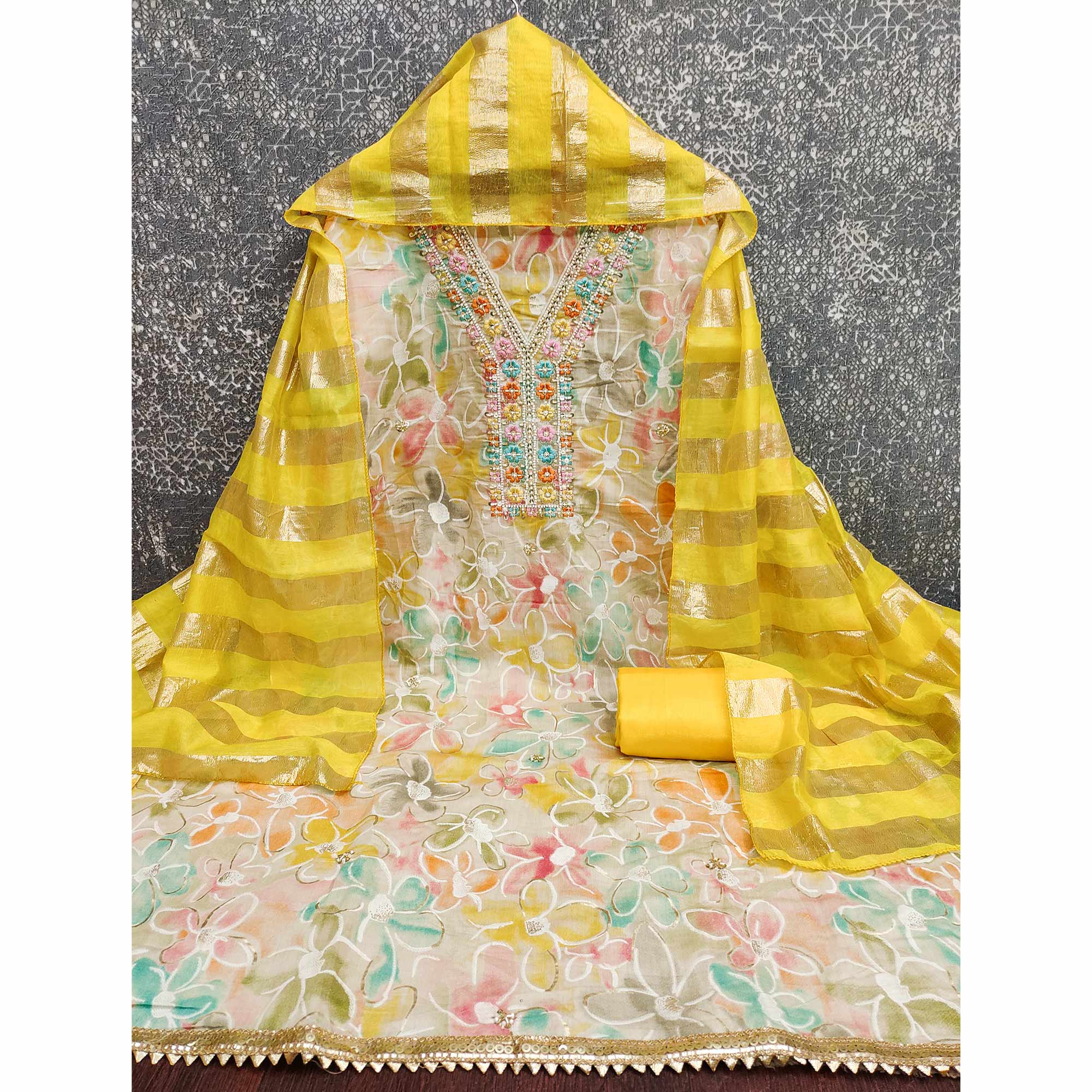Vibrant Yellow Floral Printed Roman Art Silk Dress Material Adorned With Sparkling Beads & Sequins