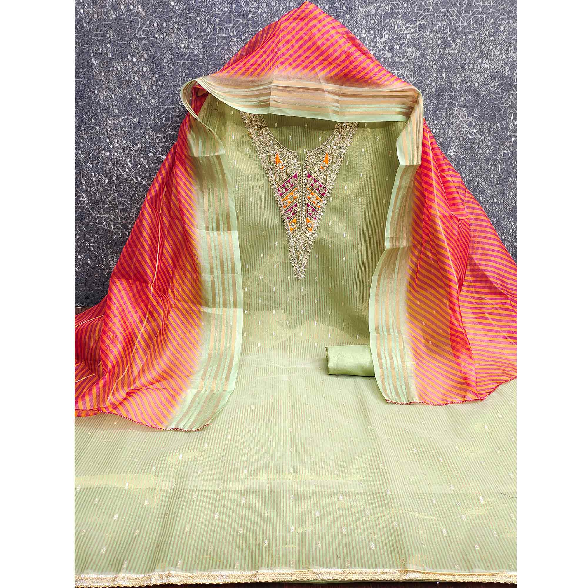 Premium Green Shimmer Dress Material With Detailed Butti Weaving & Cording Embroidery