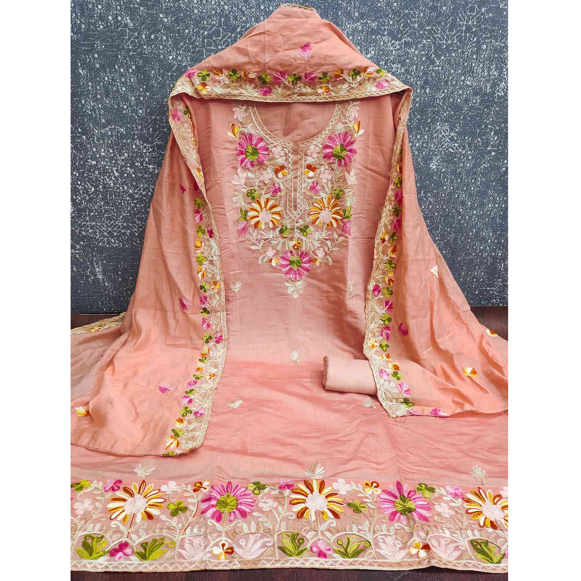 Peach Designer Roman Art Silk Dress Material Adorned With Floral Thread Embroidery Work