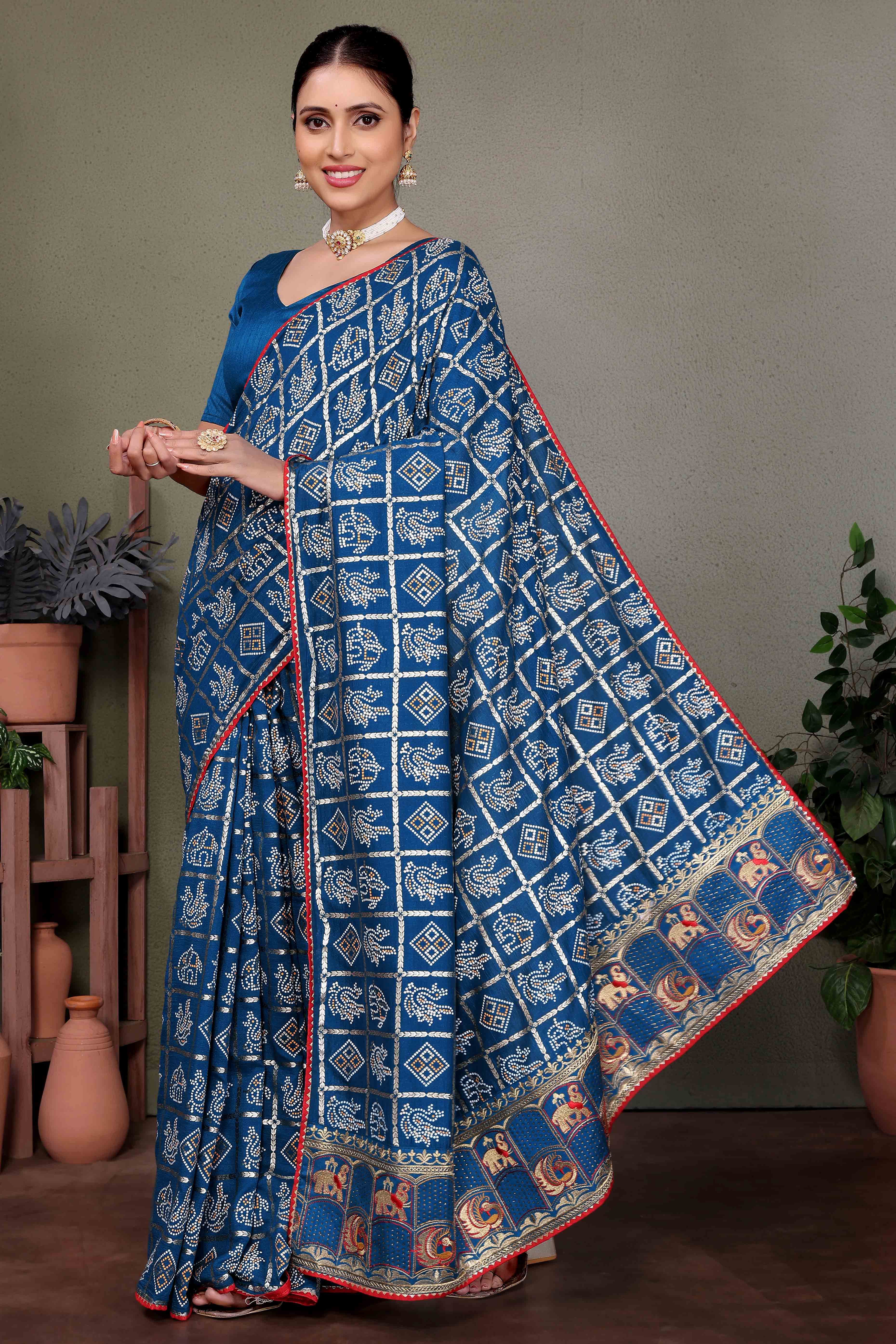 Blue Vichitra Silk Saree Featuring Bandhani Patterns and Graceful Embroidered Borders
