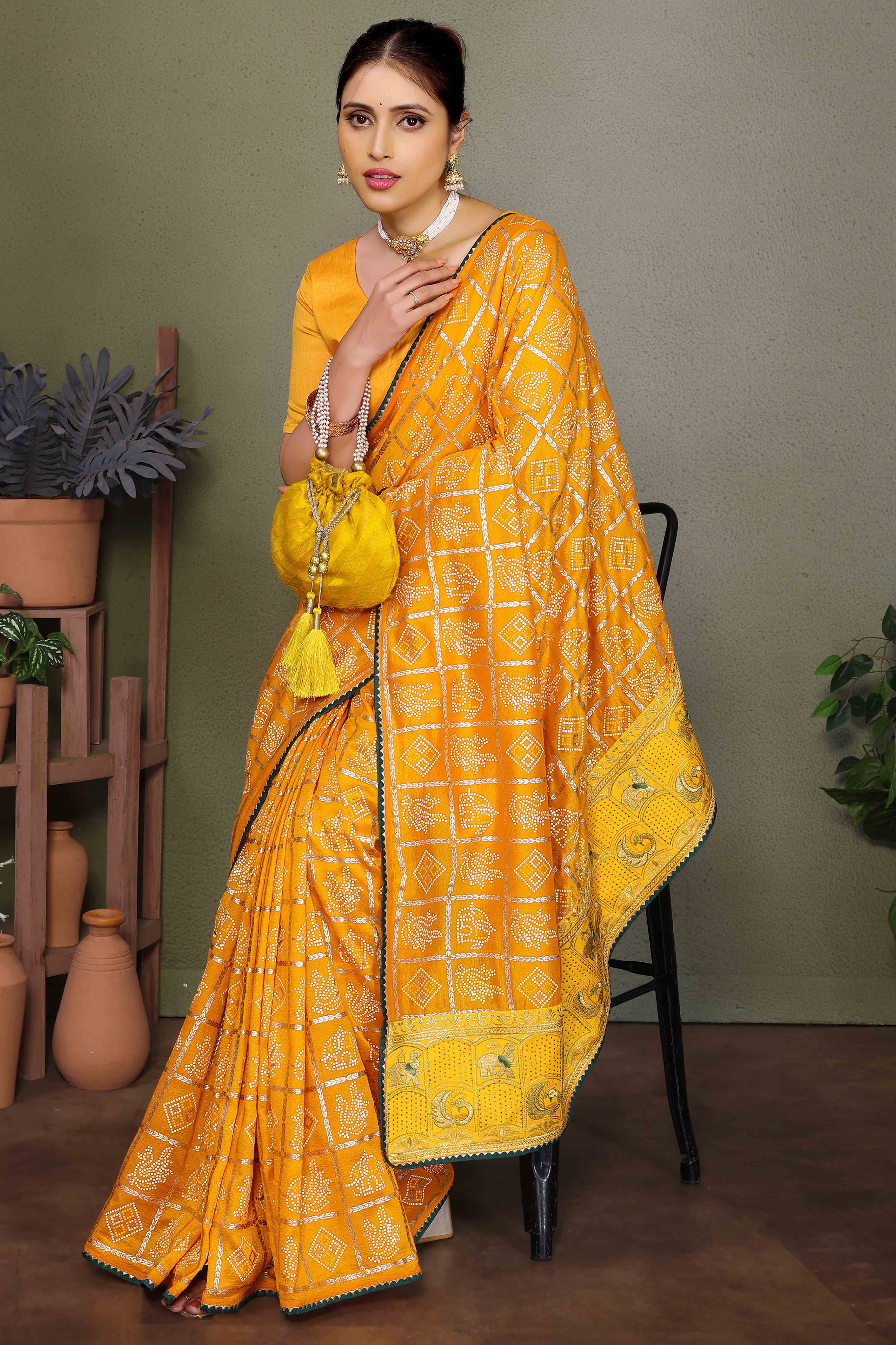 Yellow Vichitra Silk Saree Featuring Bandhani Patterns and Graceful Embroidered Borders