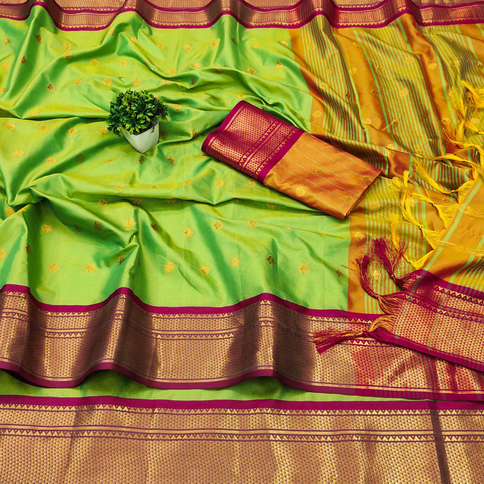 Green Zari Woven Lichi Art Silk Saree With Tassels