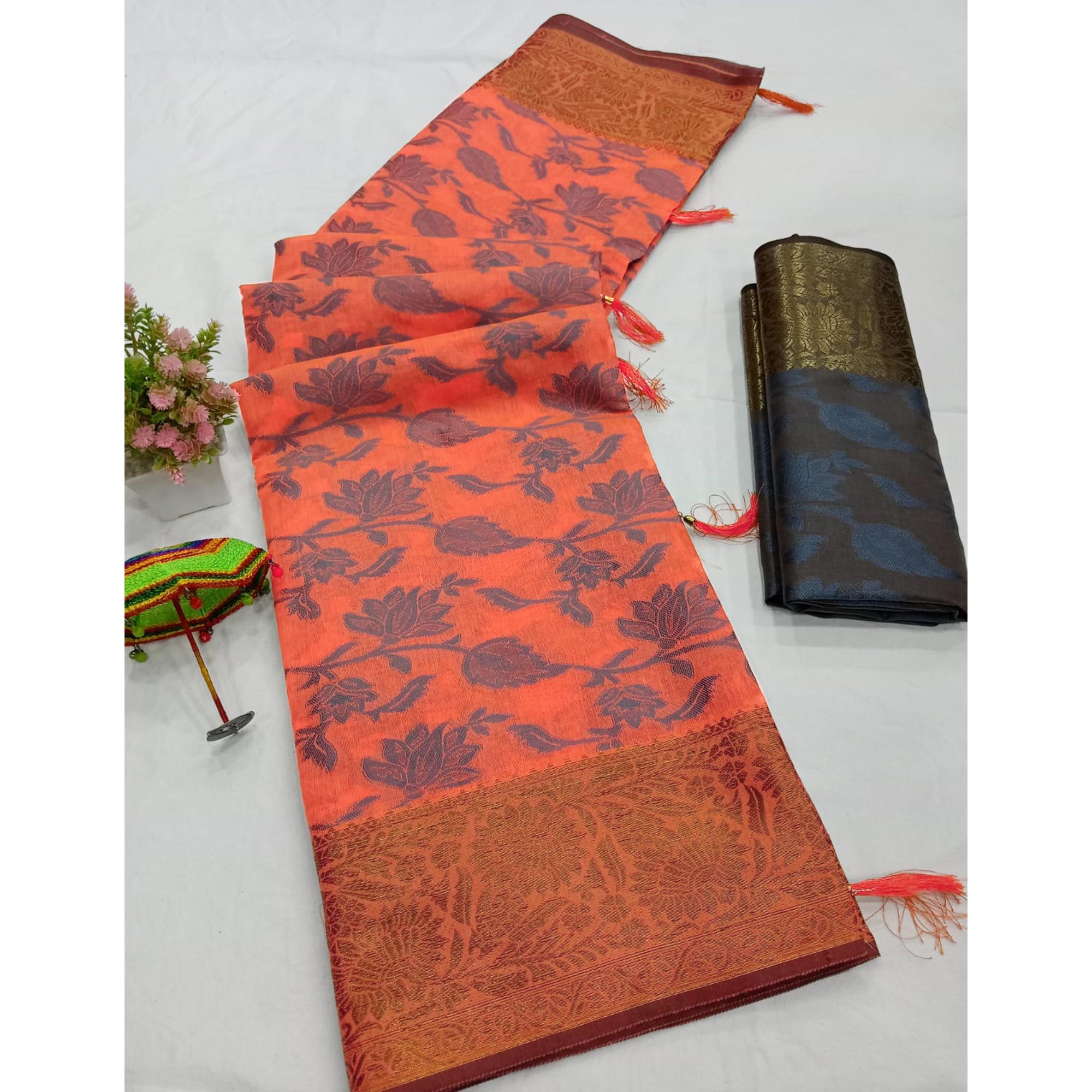 Peach Floral Woven Cotton Silk Saree With Tassels