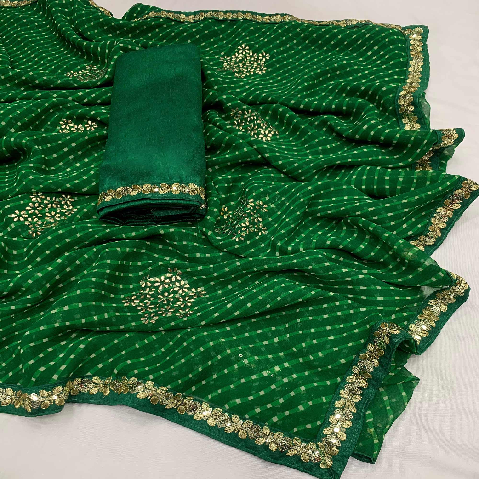 Dark Green Printed Georgette Saree With lace Border