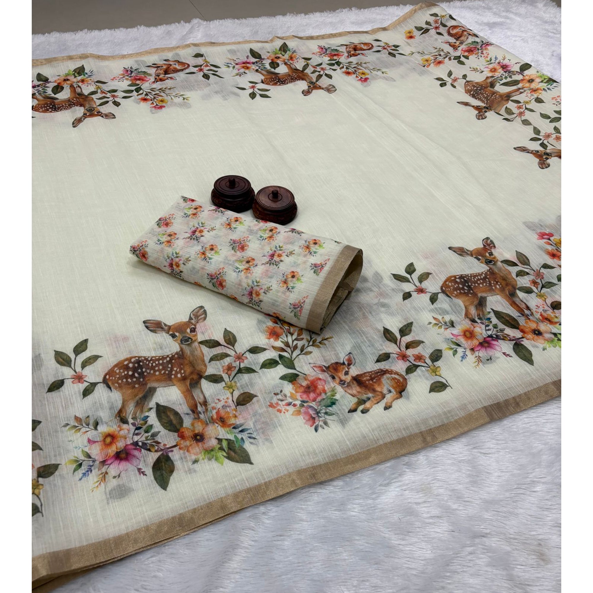 Off White Handprinted Linen Saree with Beautifully Woven Zari Edging