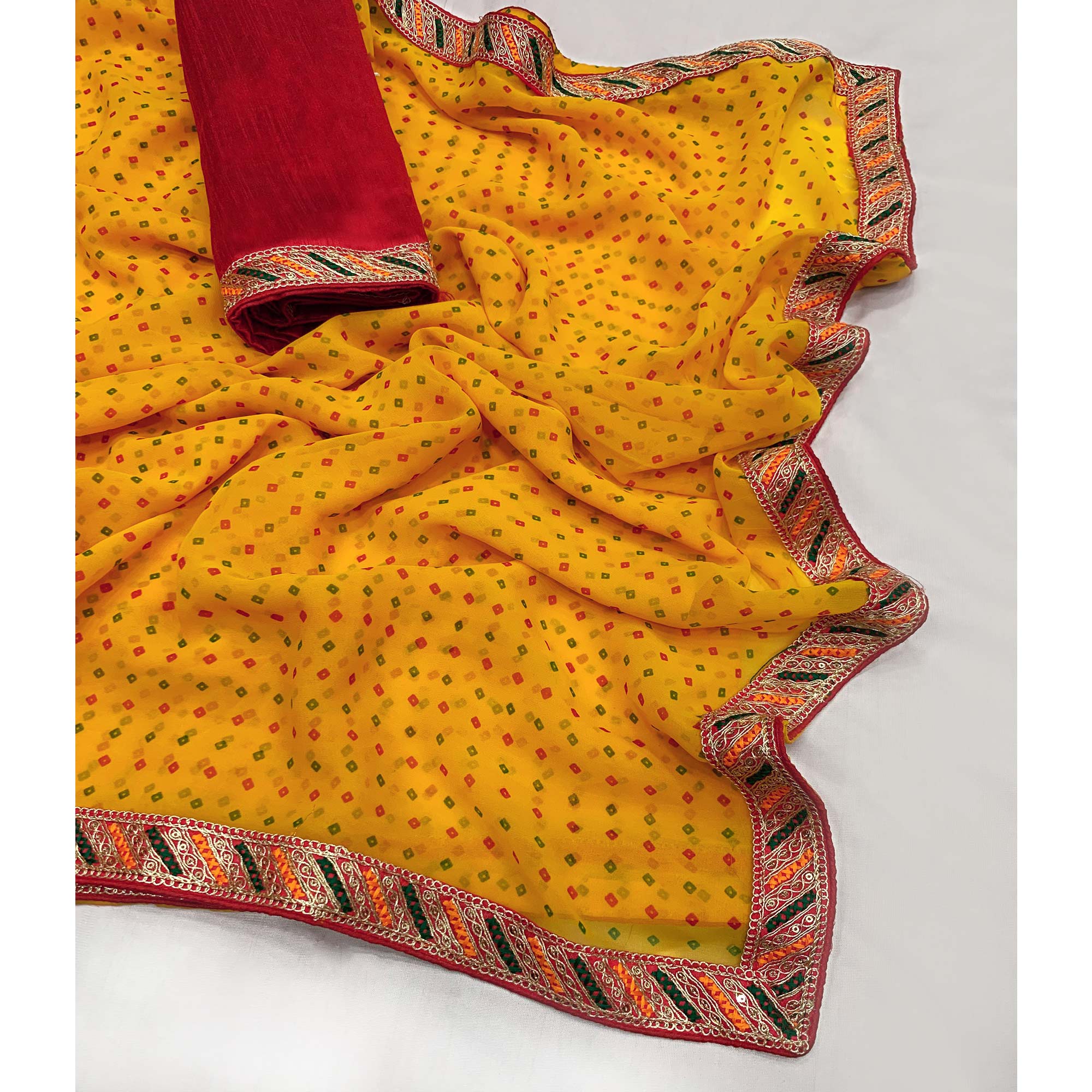Yellow Bandhani Printed With Sequins Border Georgette Saree